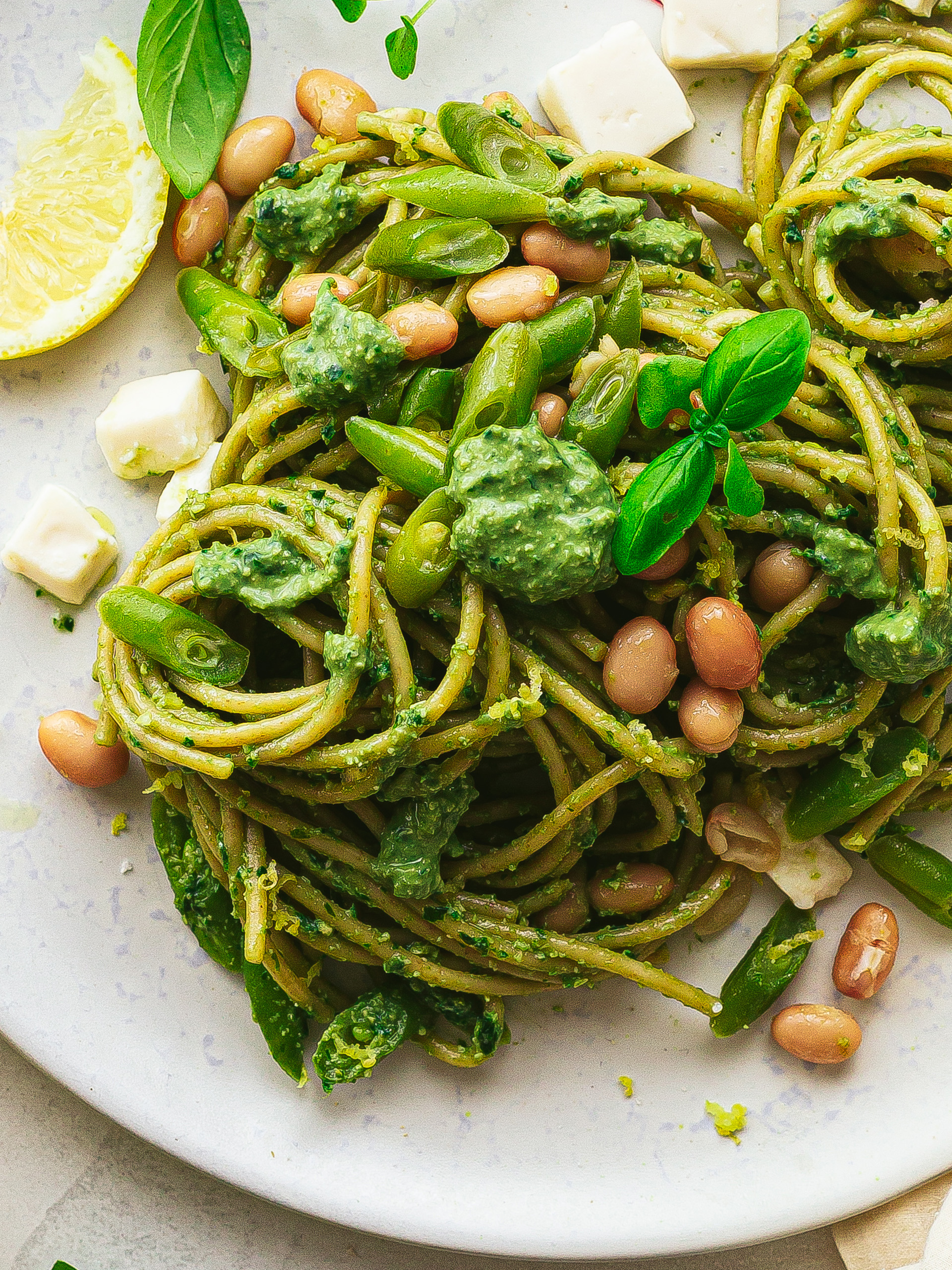 spaghetti pasta with tofu basil pesto green beans and cannellini