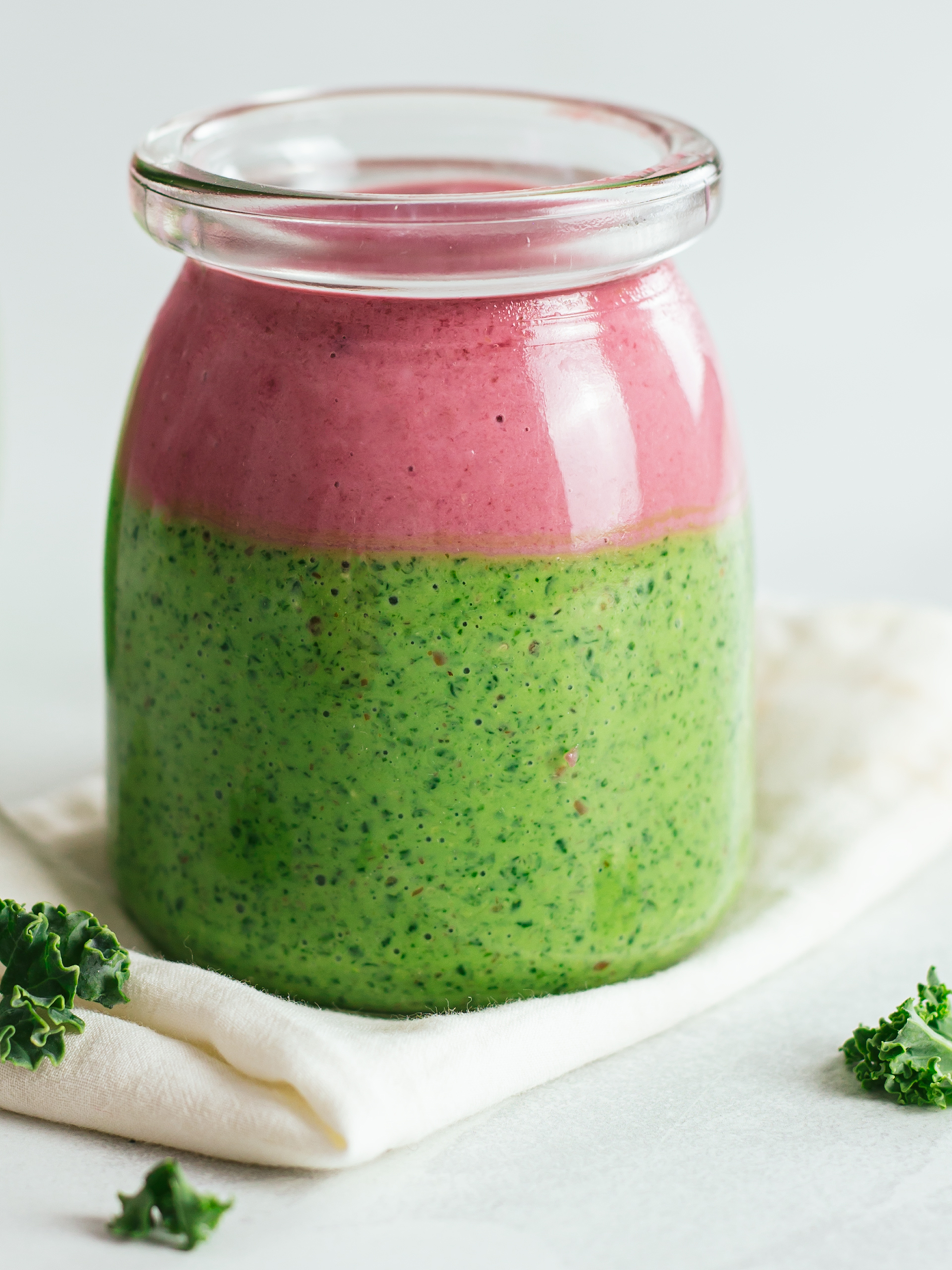 kale raspberry smoothie in a jar