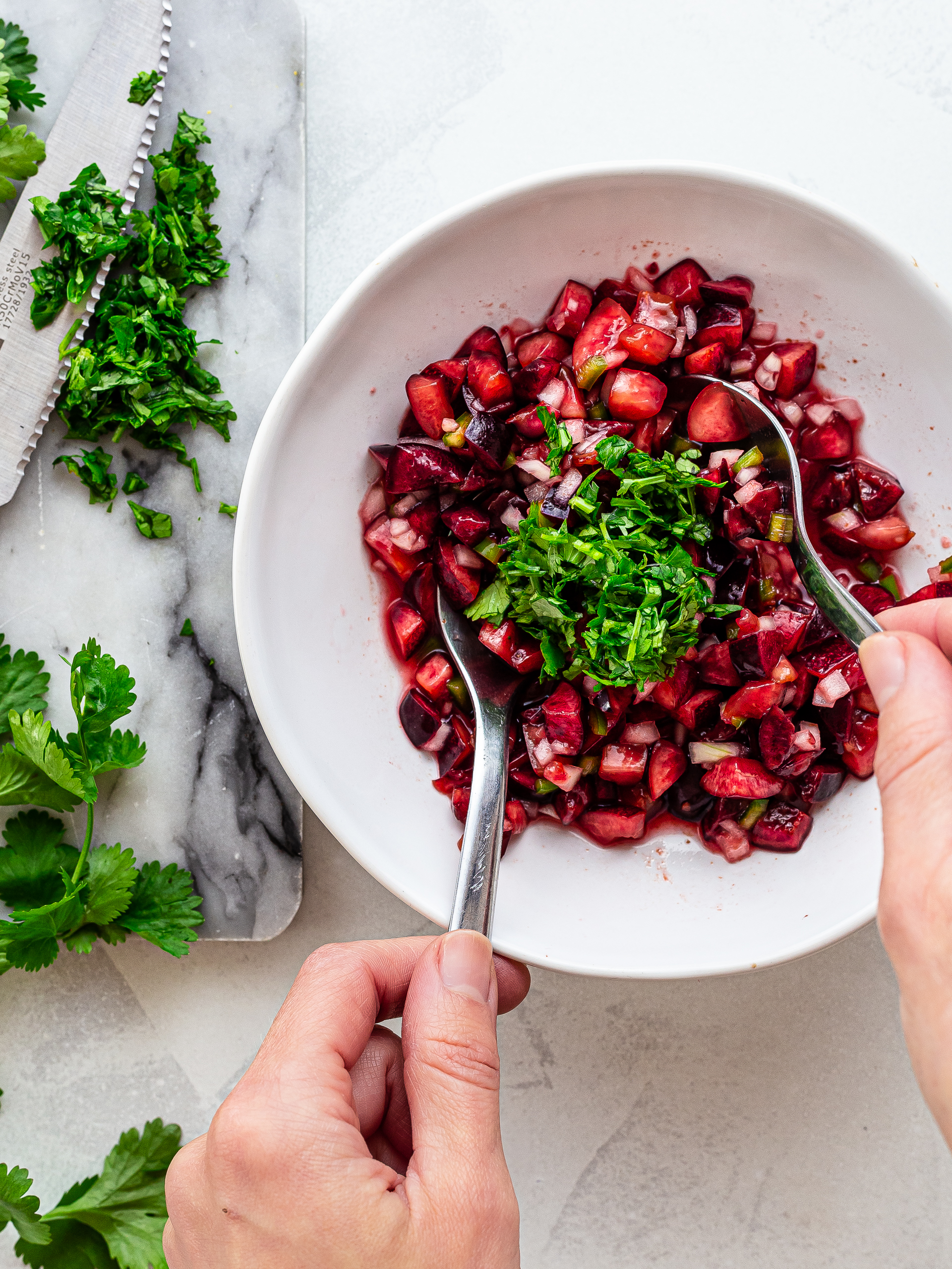 homemade fresh cherry salsa mixed with chopped coriander