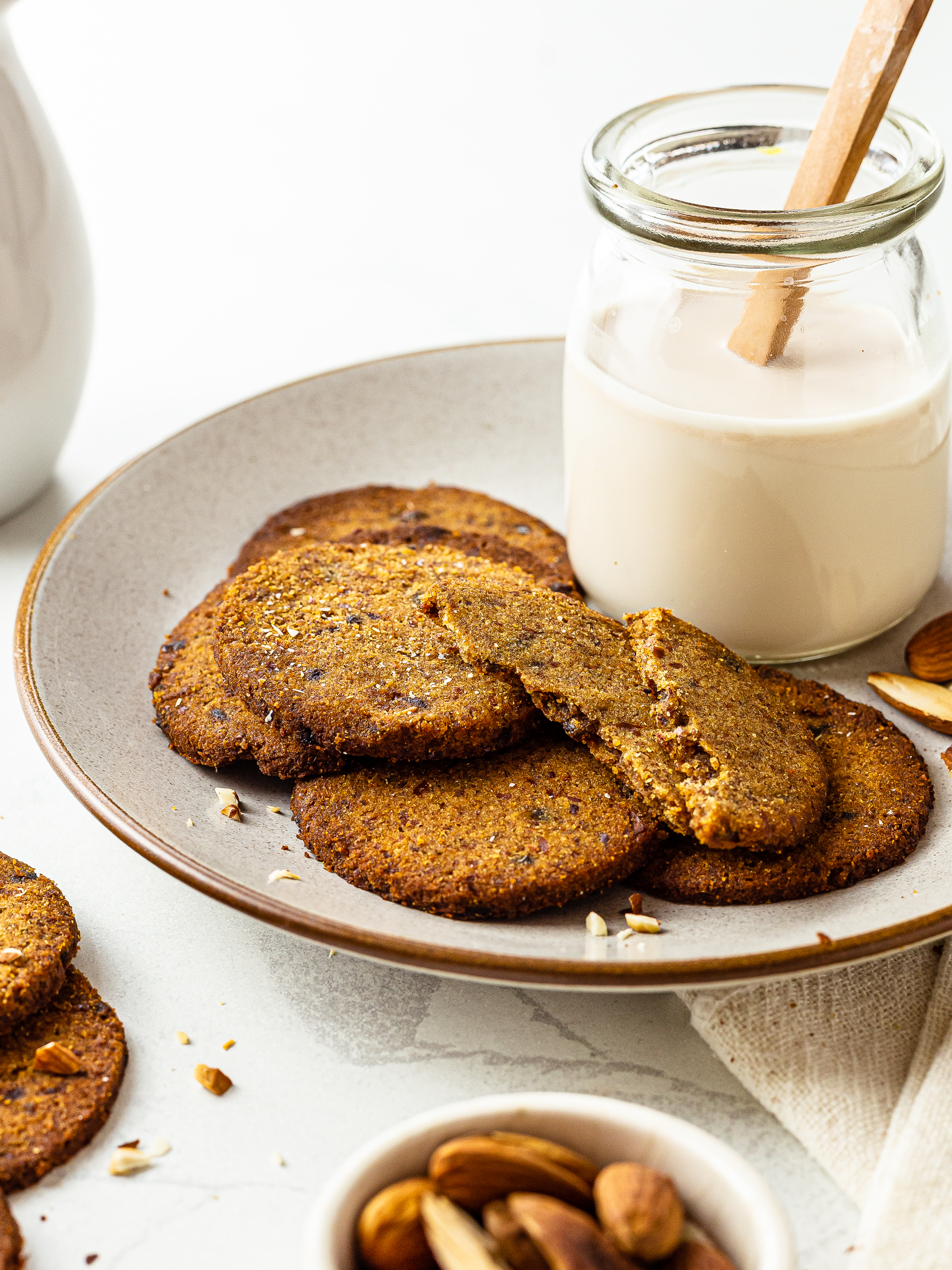 healthy date and almond pulp cookies on a plate