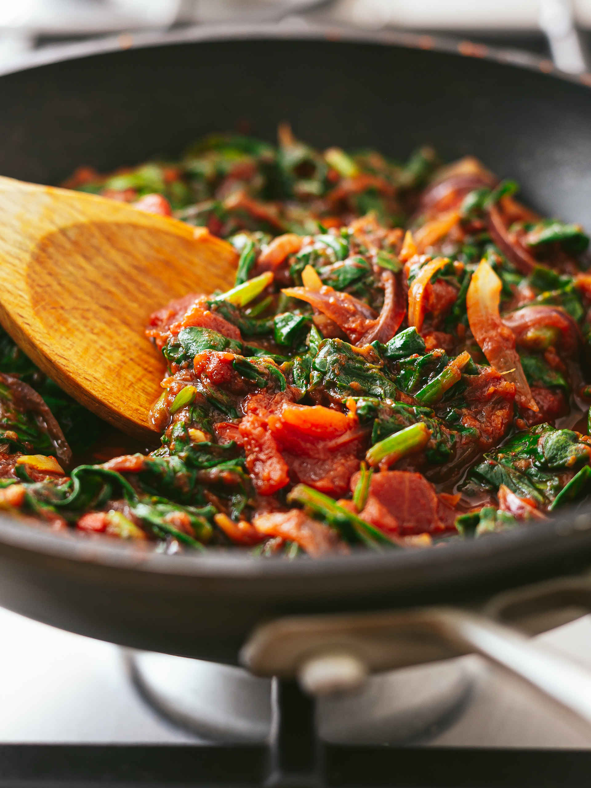 african ghana spinach tomato stew in a pan