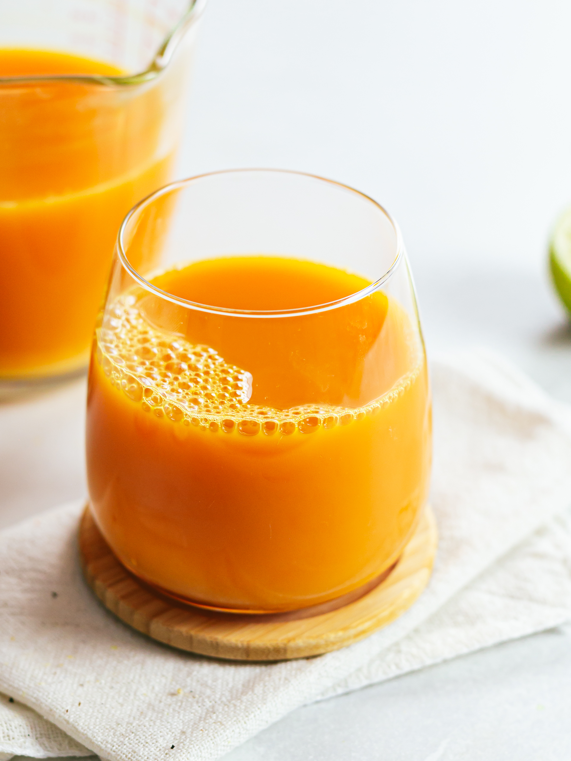 carrot ginger turmeric juice in a glass