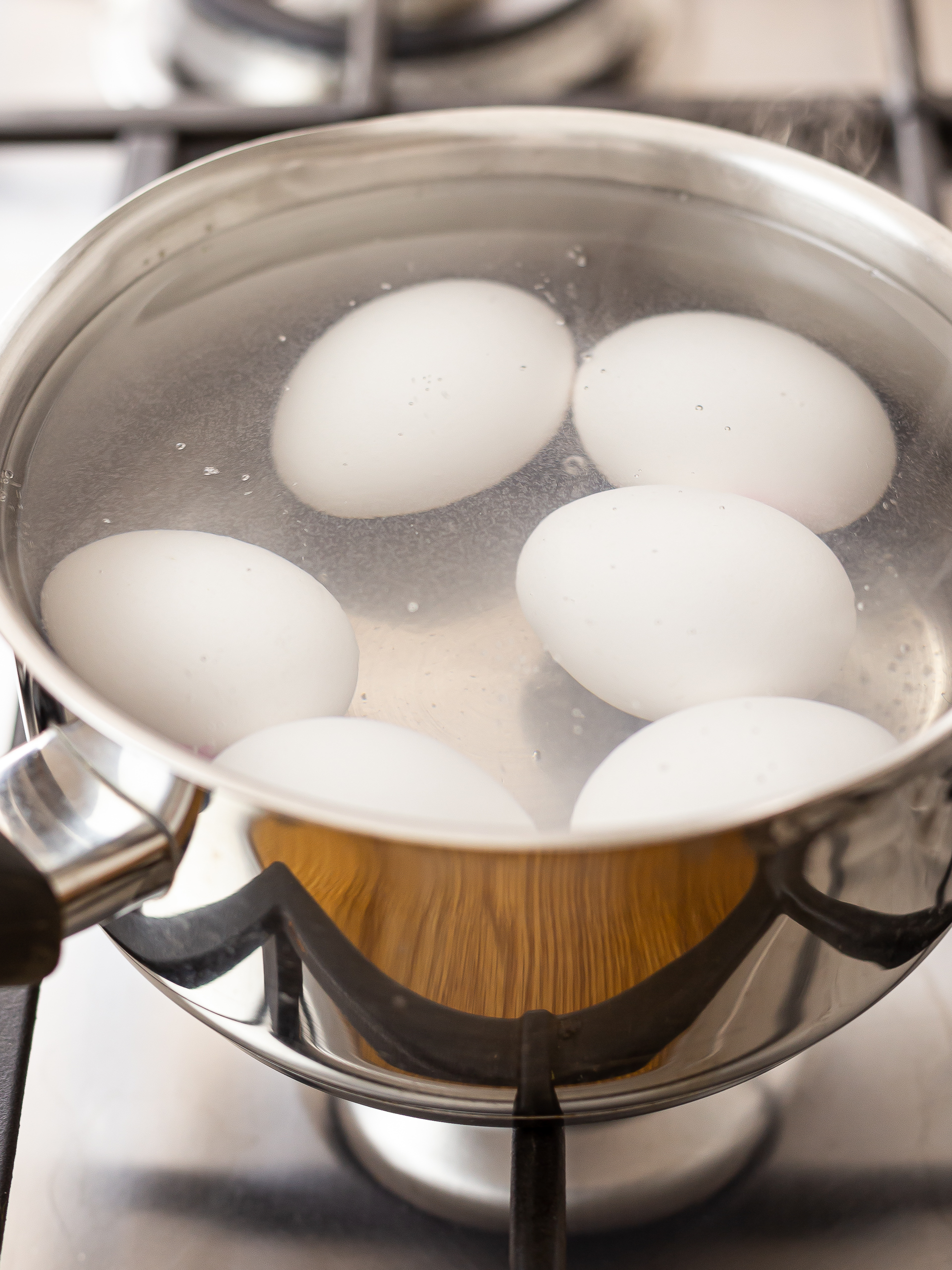 boiled eggs in a pot of water