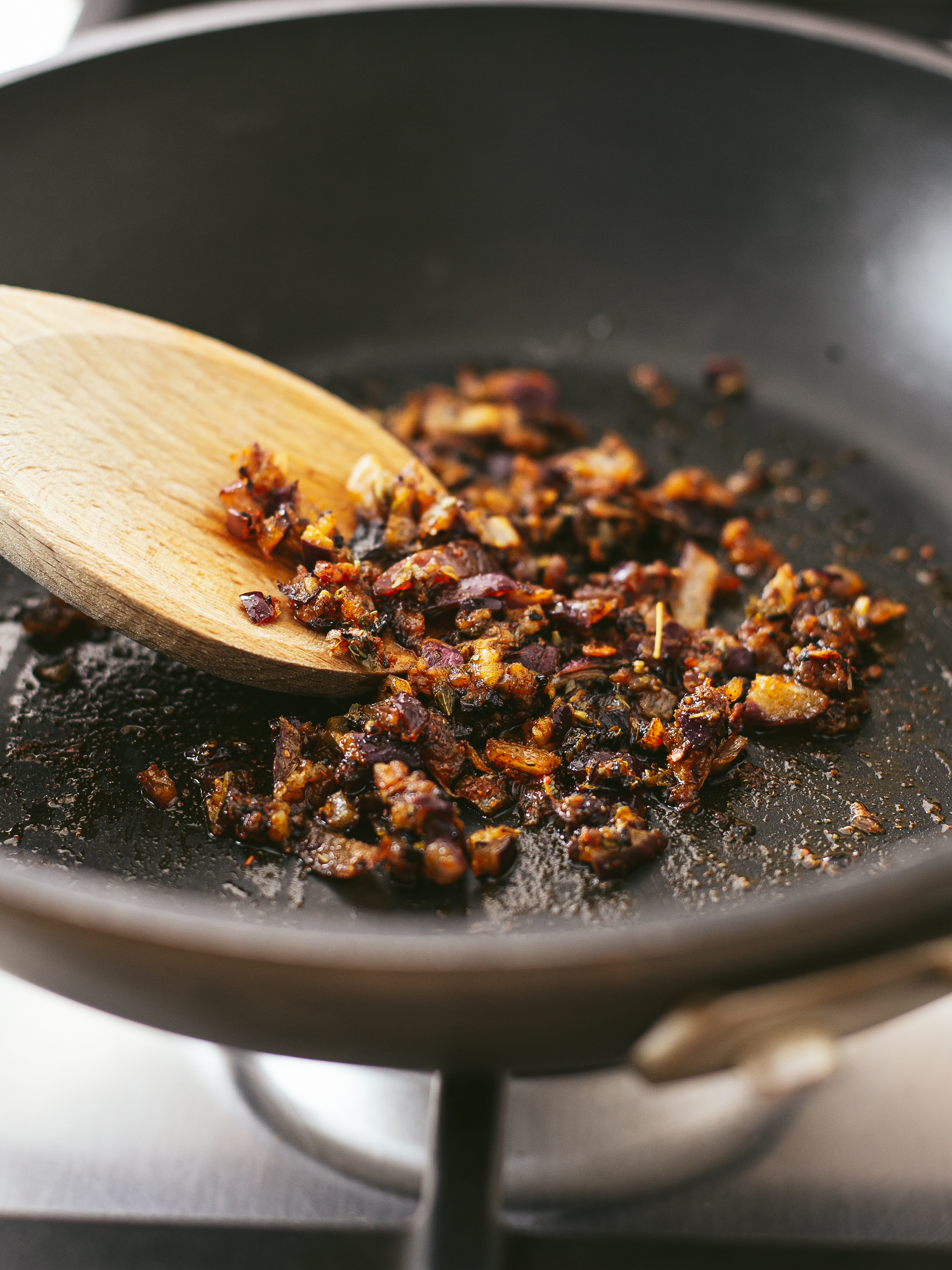 onions and garlic sizzled in a pan with spices