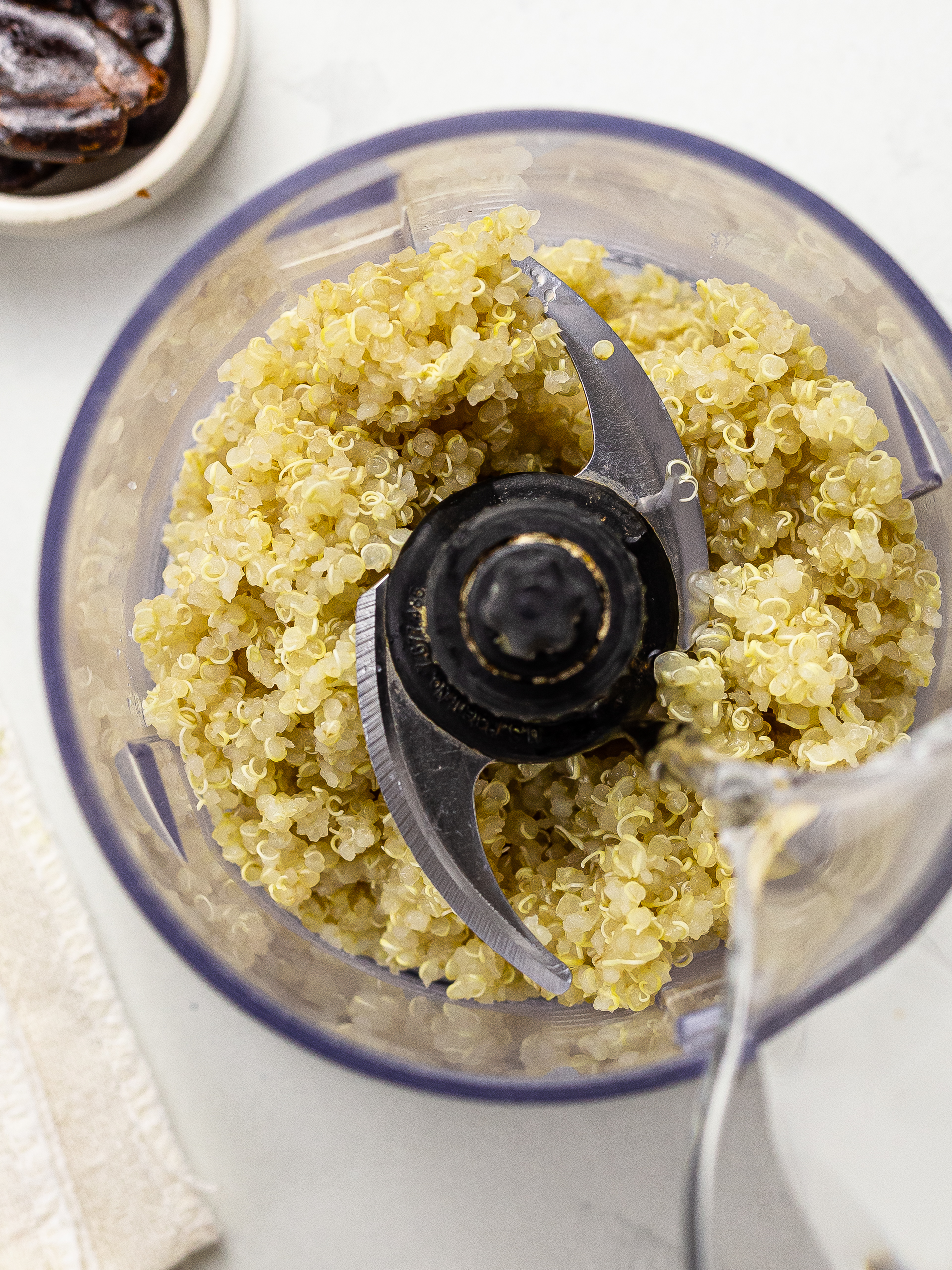quinoa in a blender with water for quinoa milk