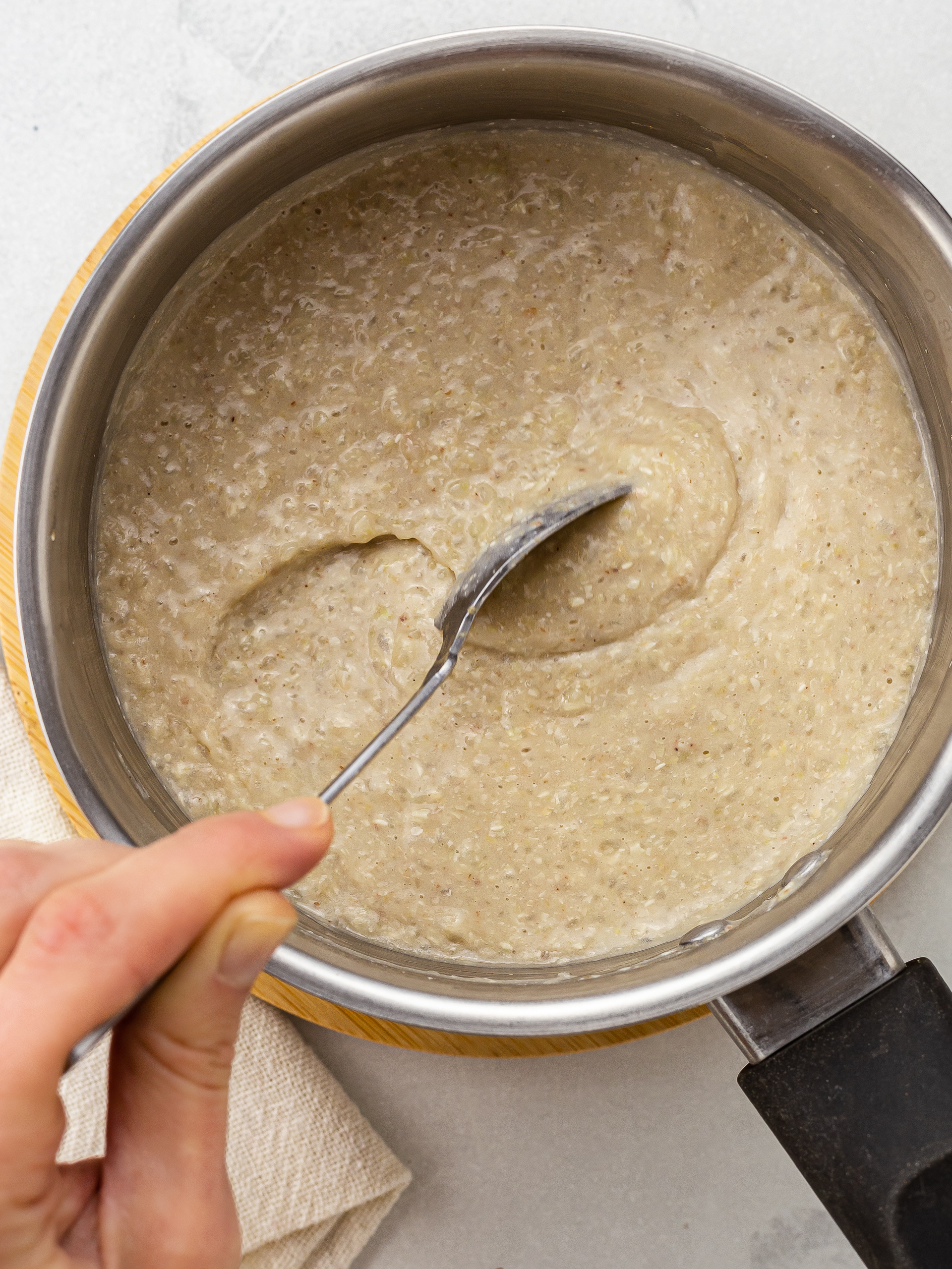 cooked buckwheat porridge thick and creamy in a pot