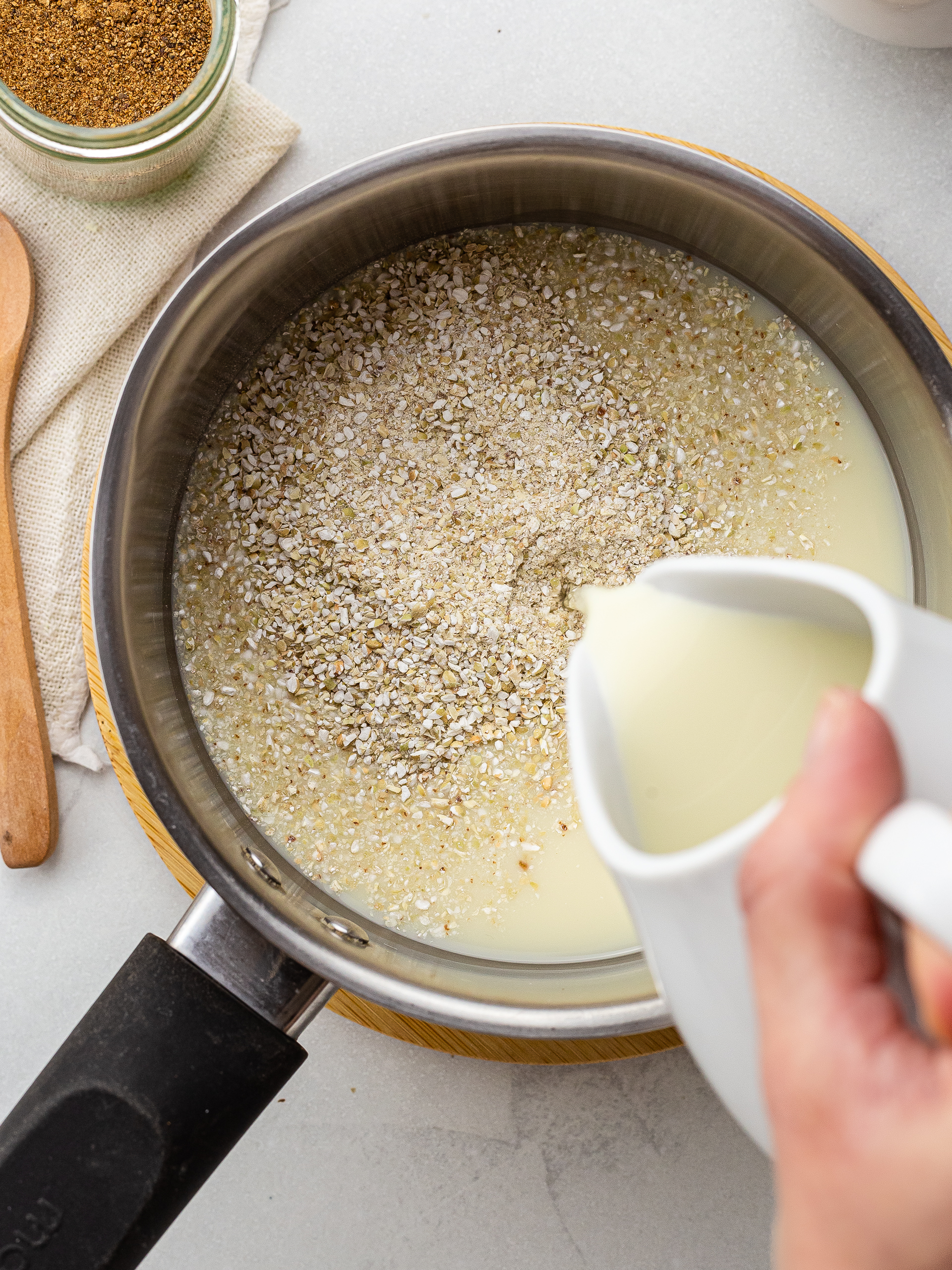 milk poured over milled buckwheat groats for cream of buckwheat