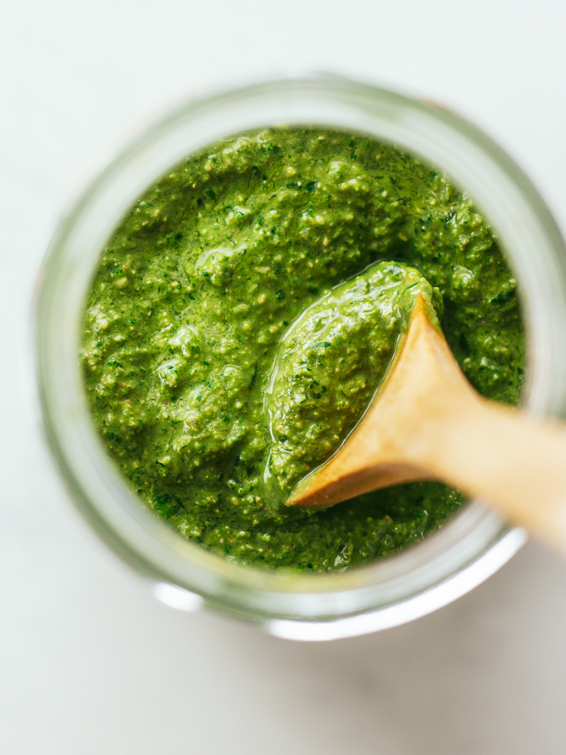 homemade silken tofu basil pesto sauce in a jar