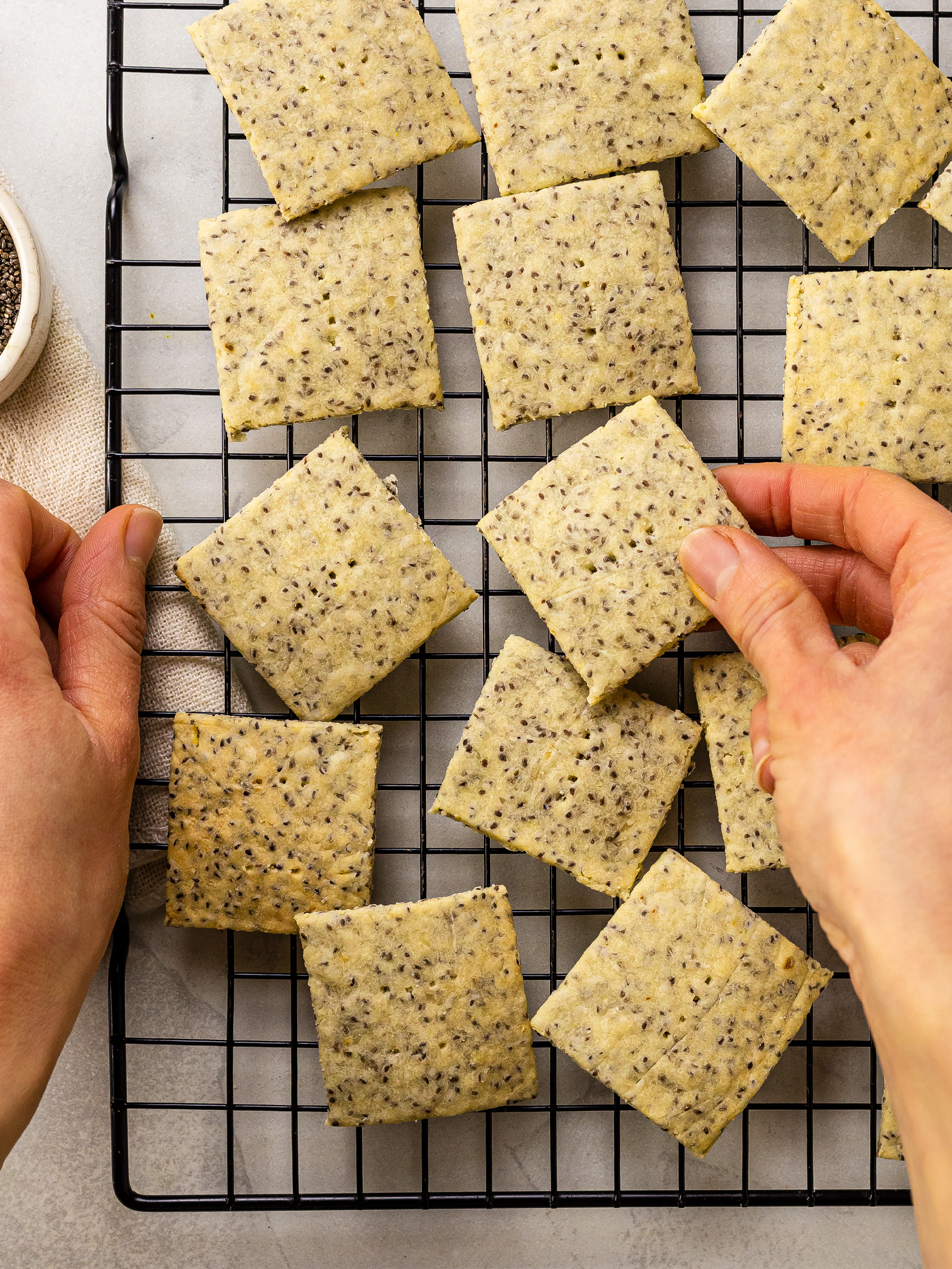 baked chia seed crackers on a rack