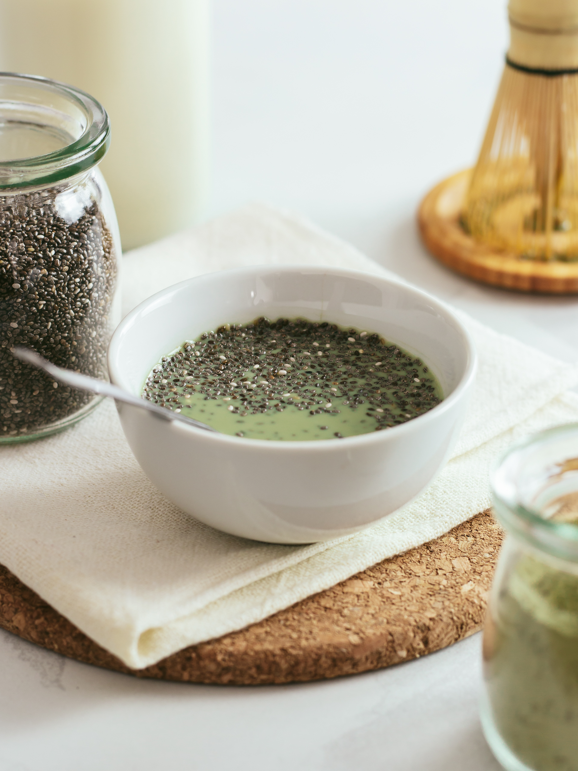 chia seeds in a pot with matcha flavoured milk