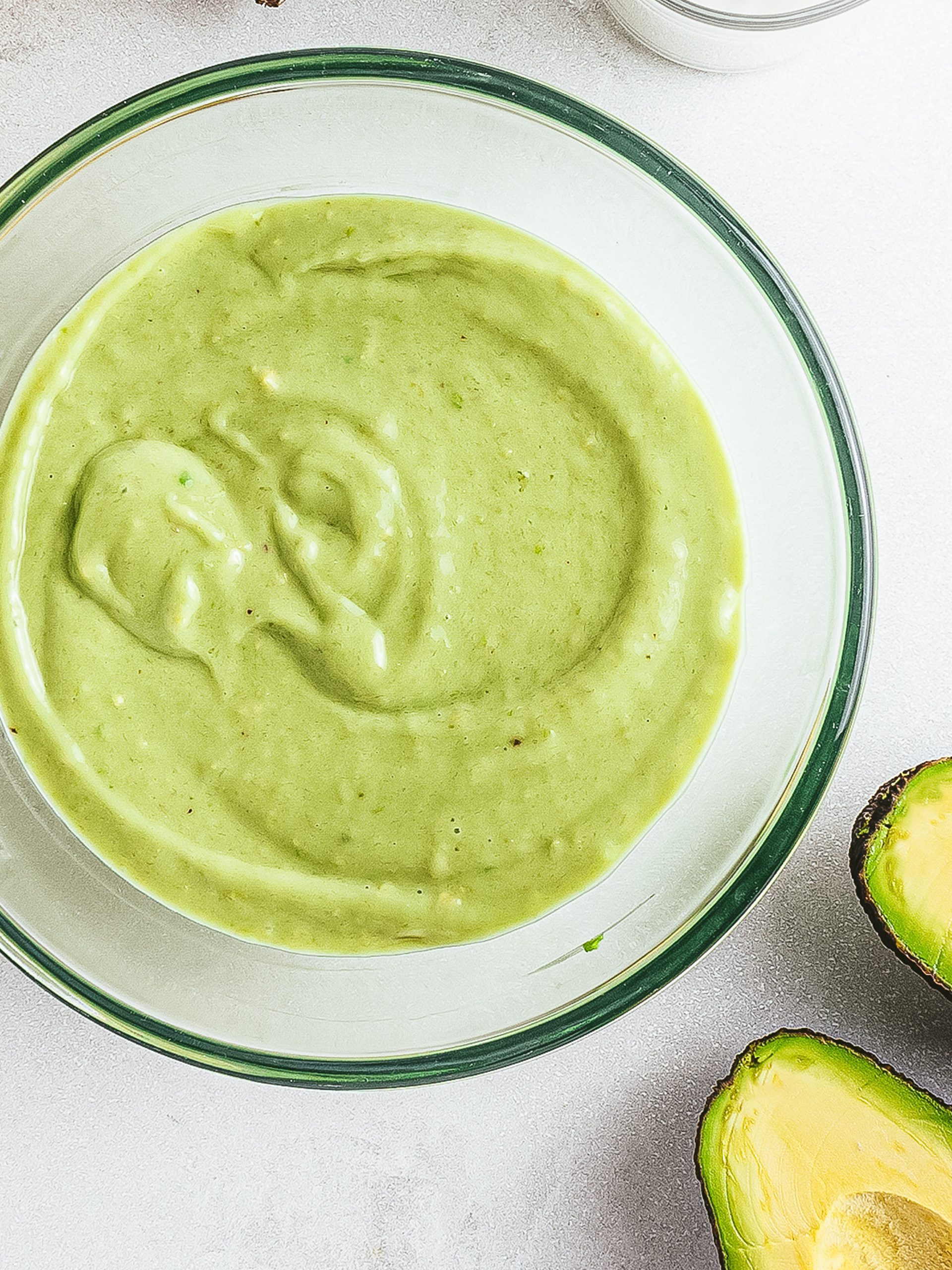 avocado waffle batter with coconut milk in a bowl