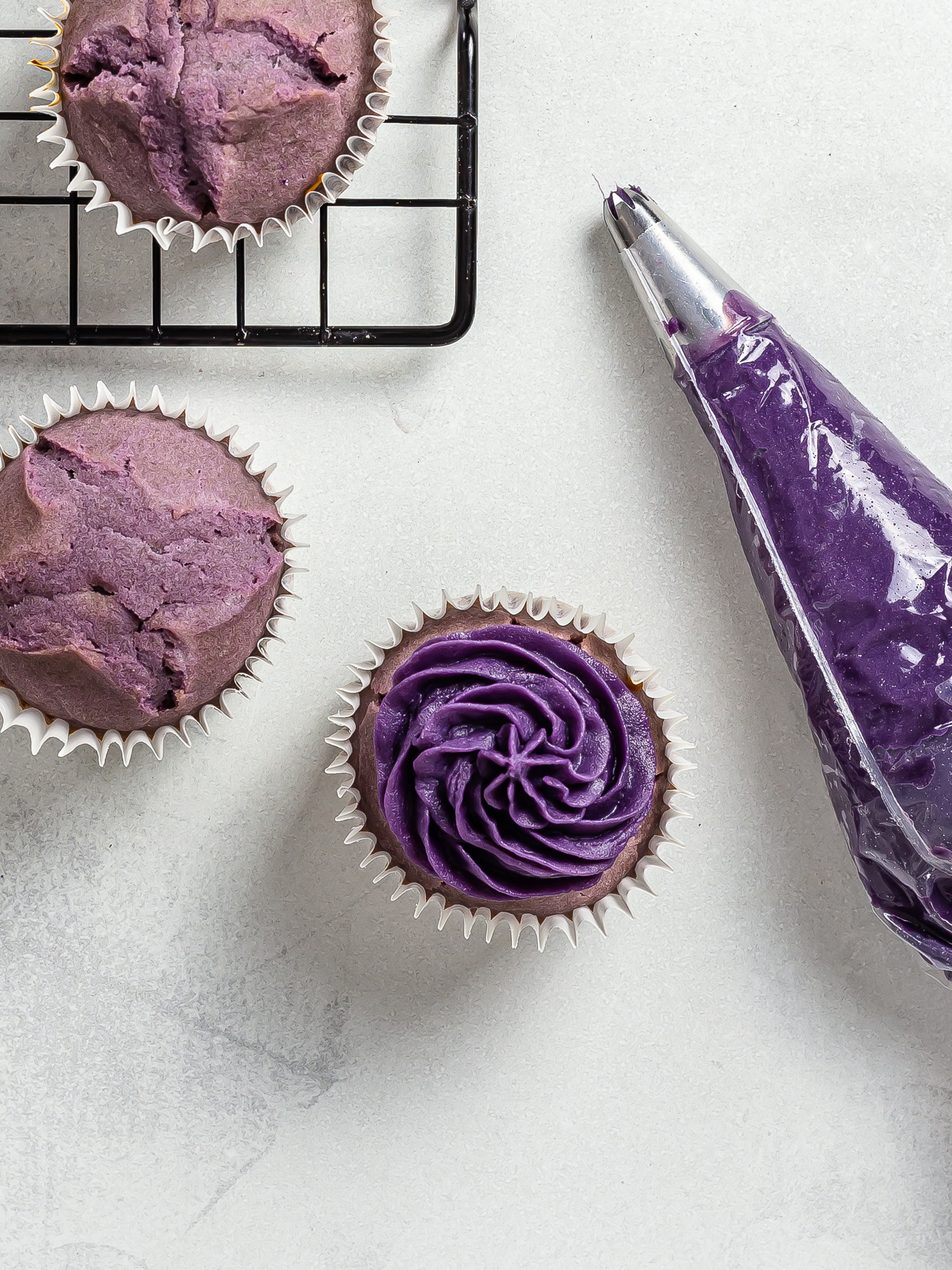 ube cupcakes frosted with purple ube frosting