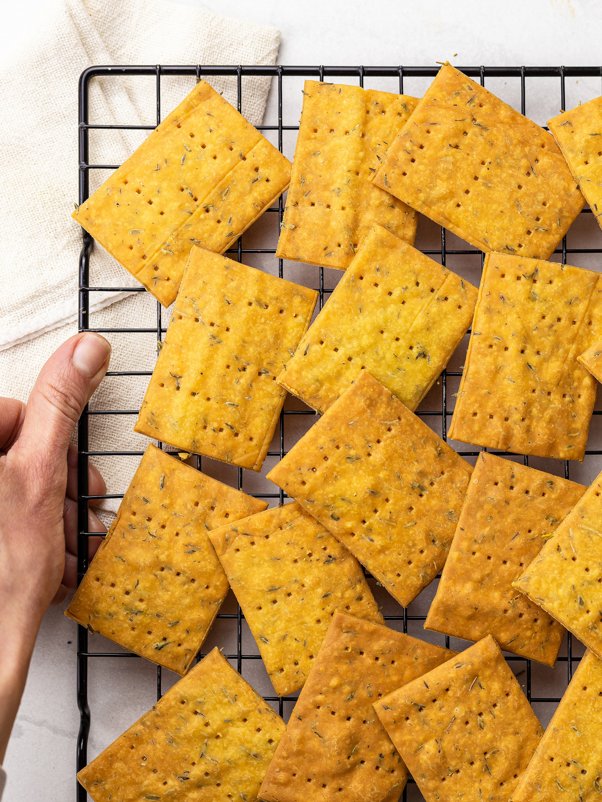 baked chickpea crackers on a cooling rack