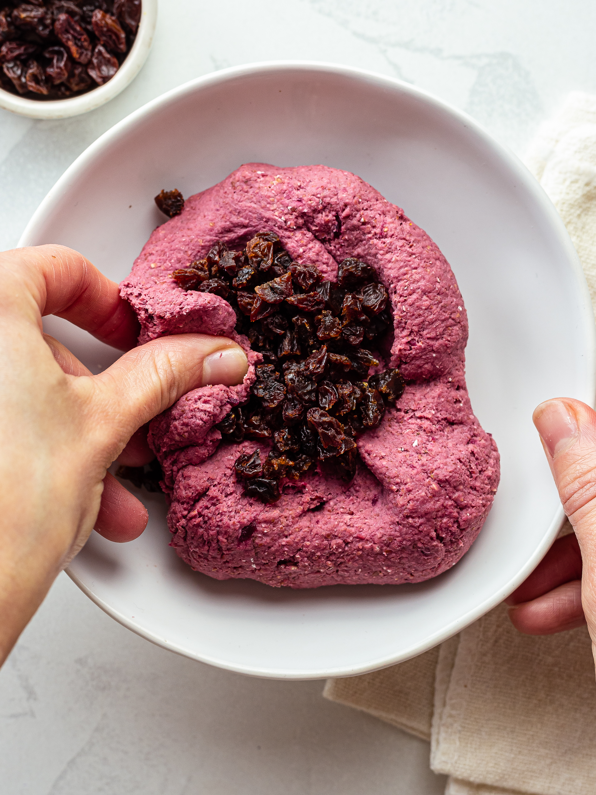 beet oat bar dough mixed with raisins