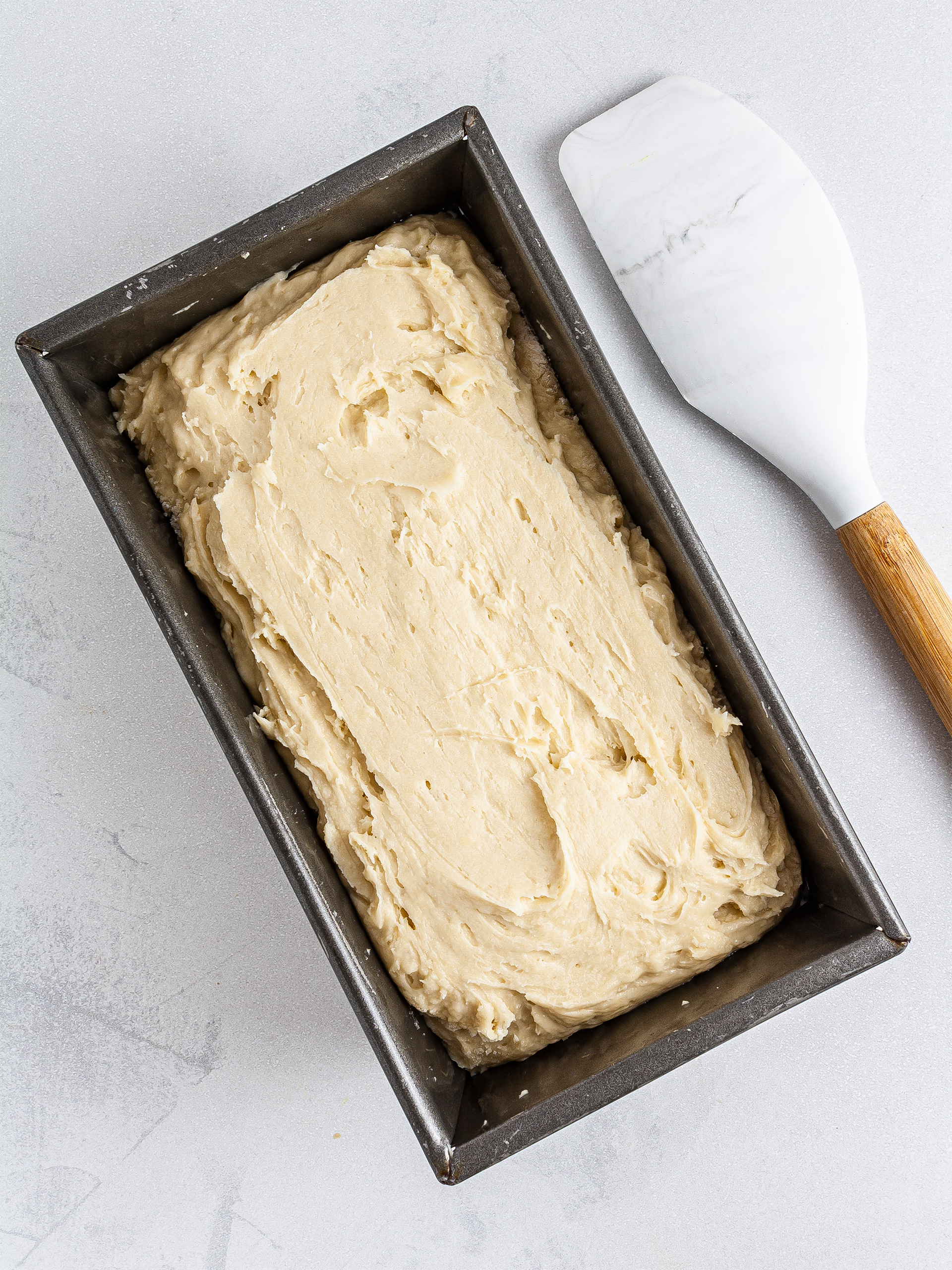 Brioche dough in a loaf tin