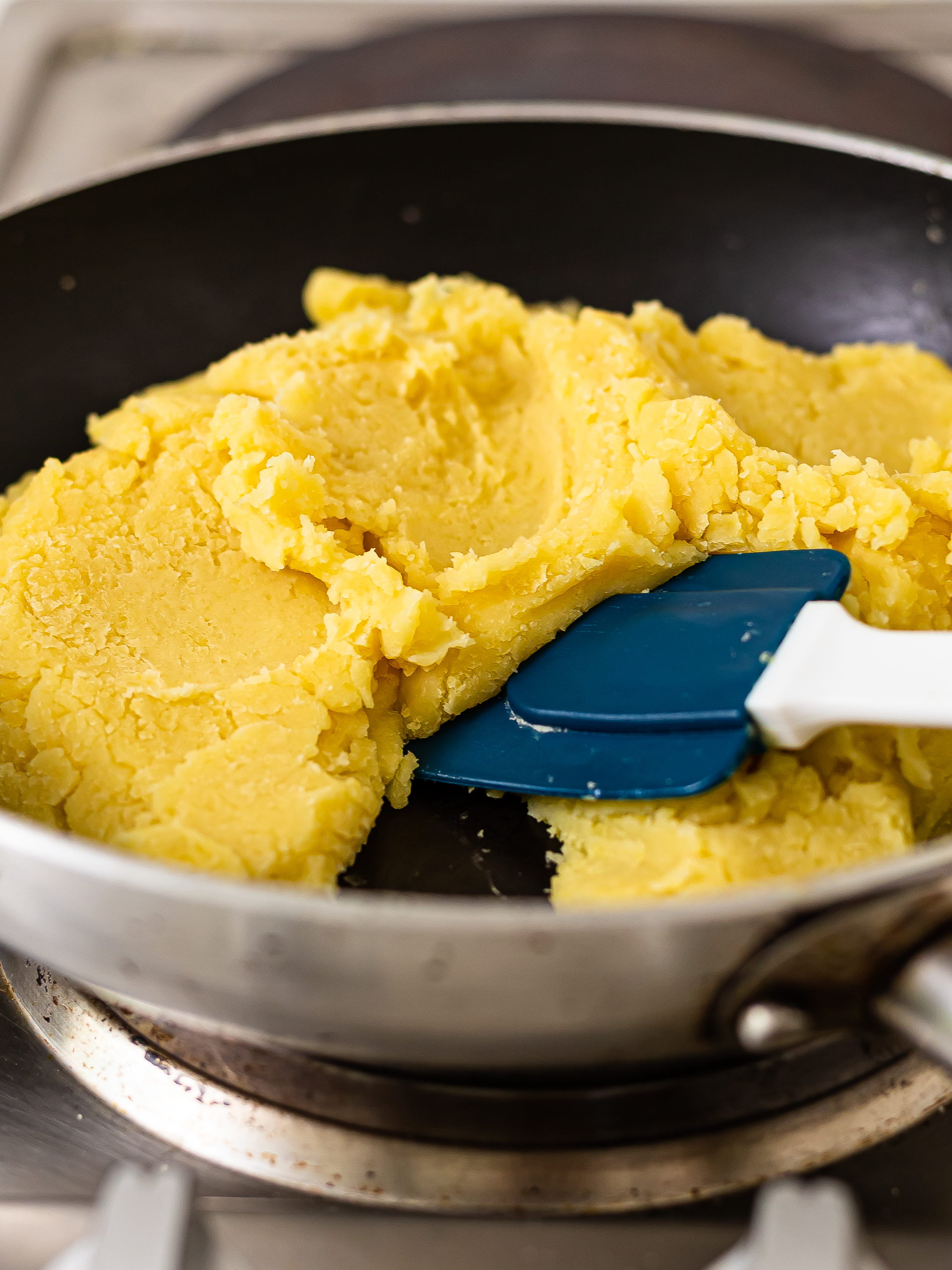 yellow mung bean paste cooked in a pan