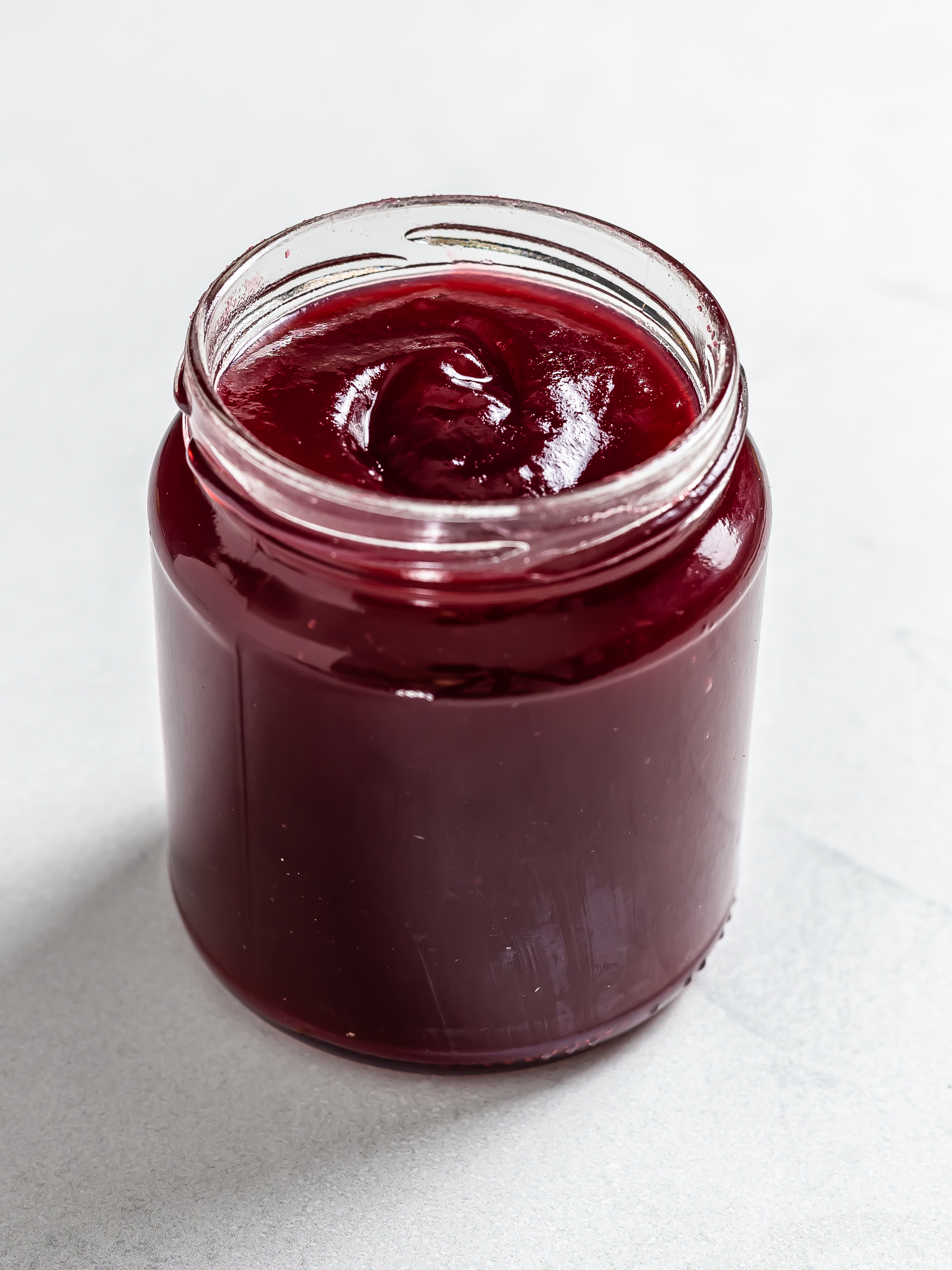 sugar-free seedless apple raspberry jam in jar