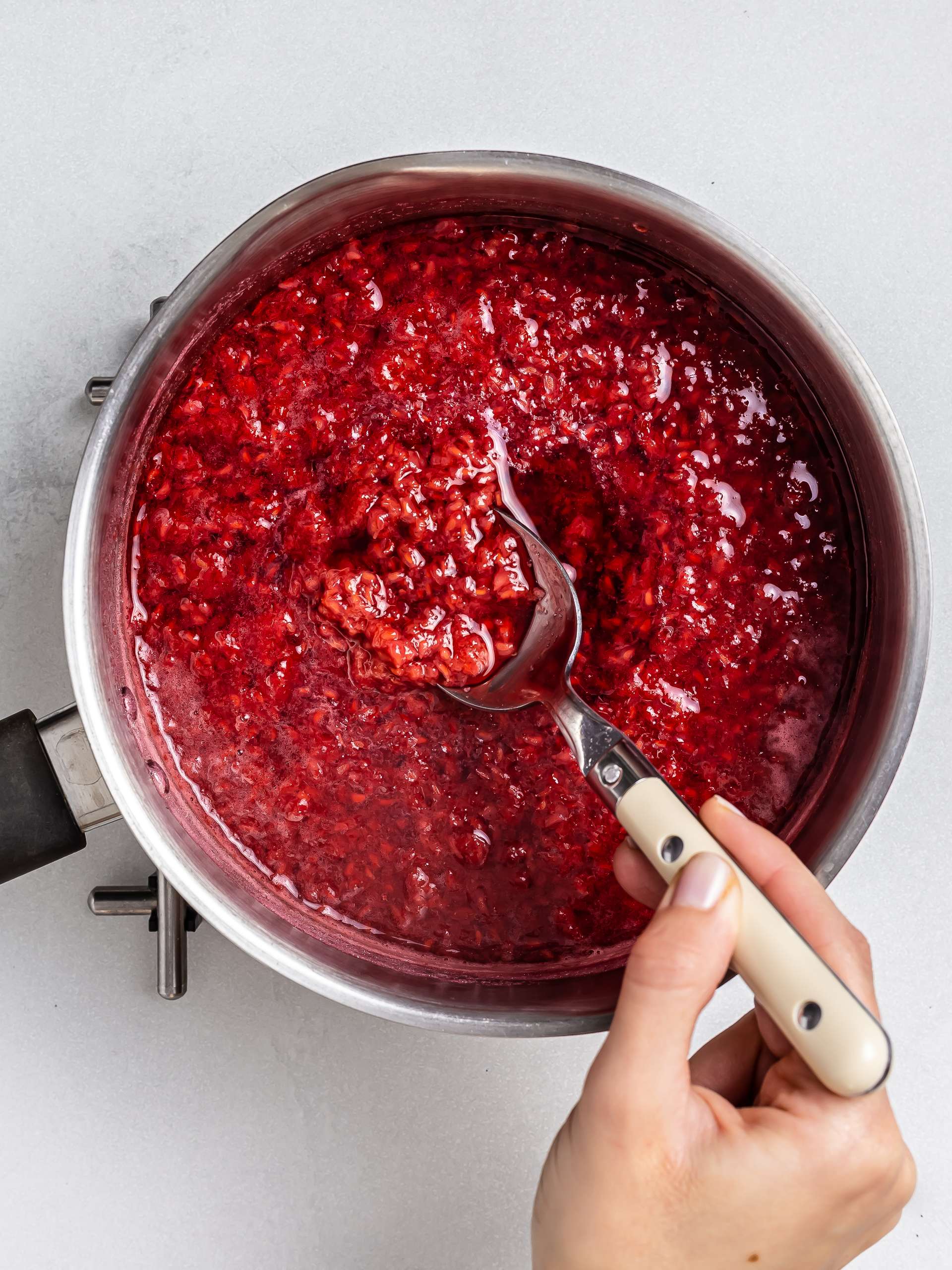 cooked raspberries in a pot