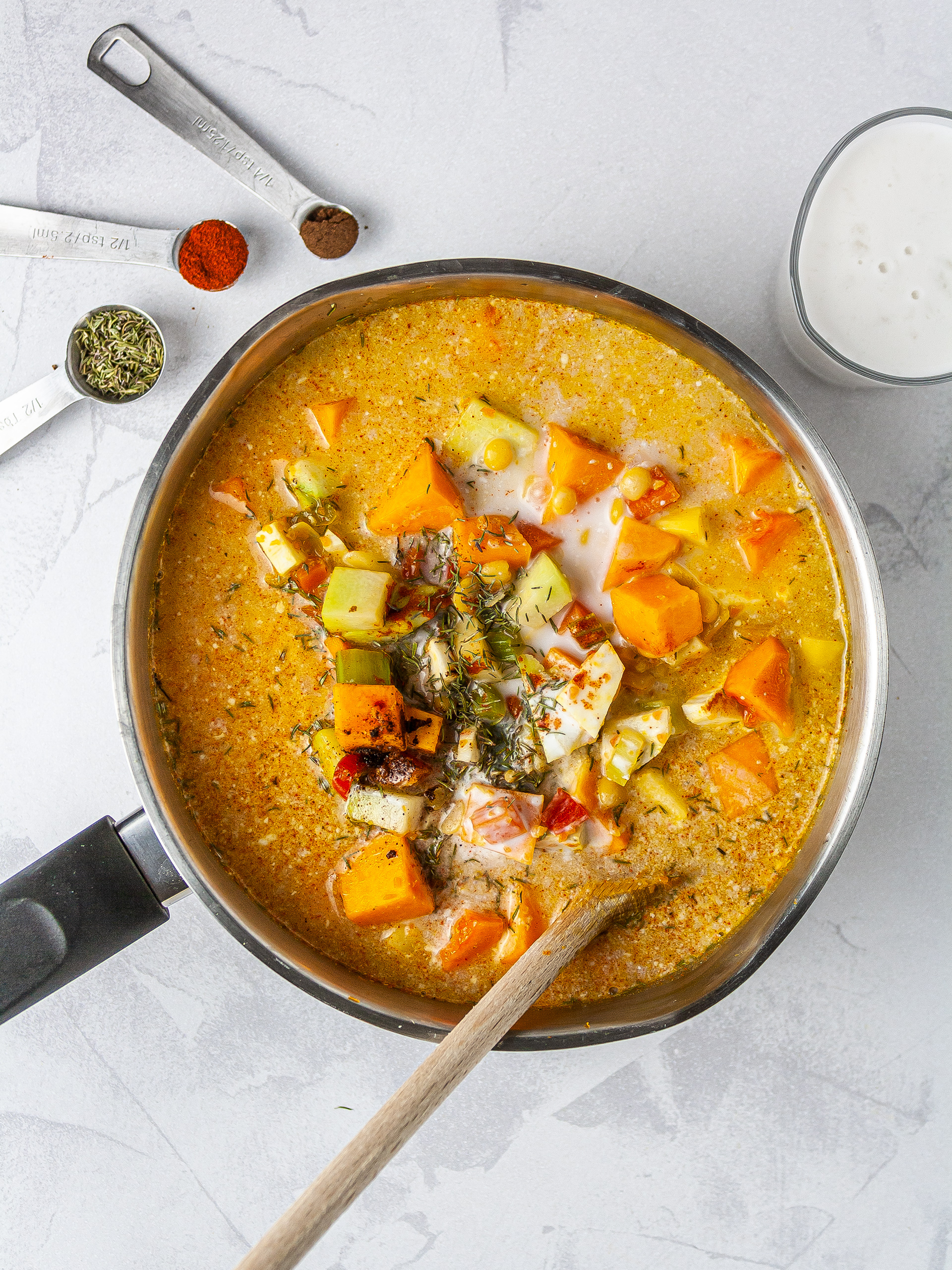 Jamaican soup with coconut milk, thyme, cayenne pepper and allspice.