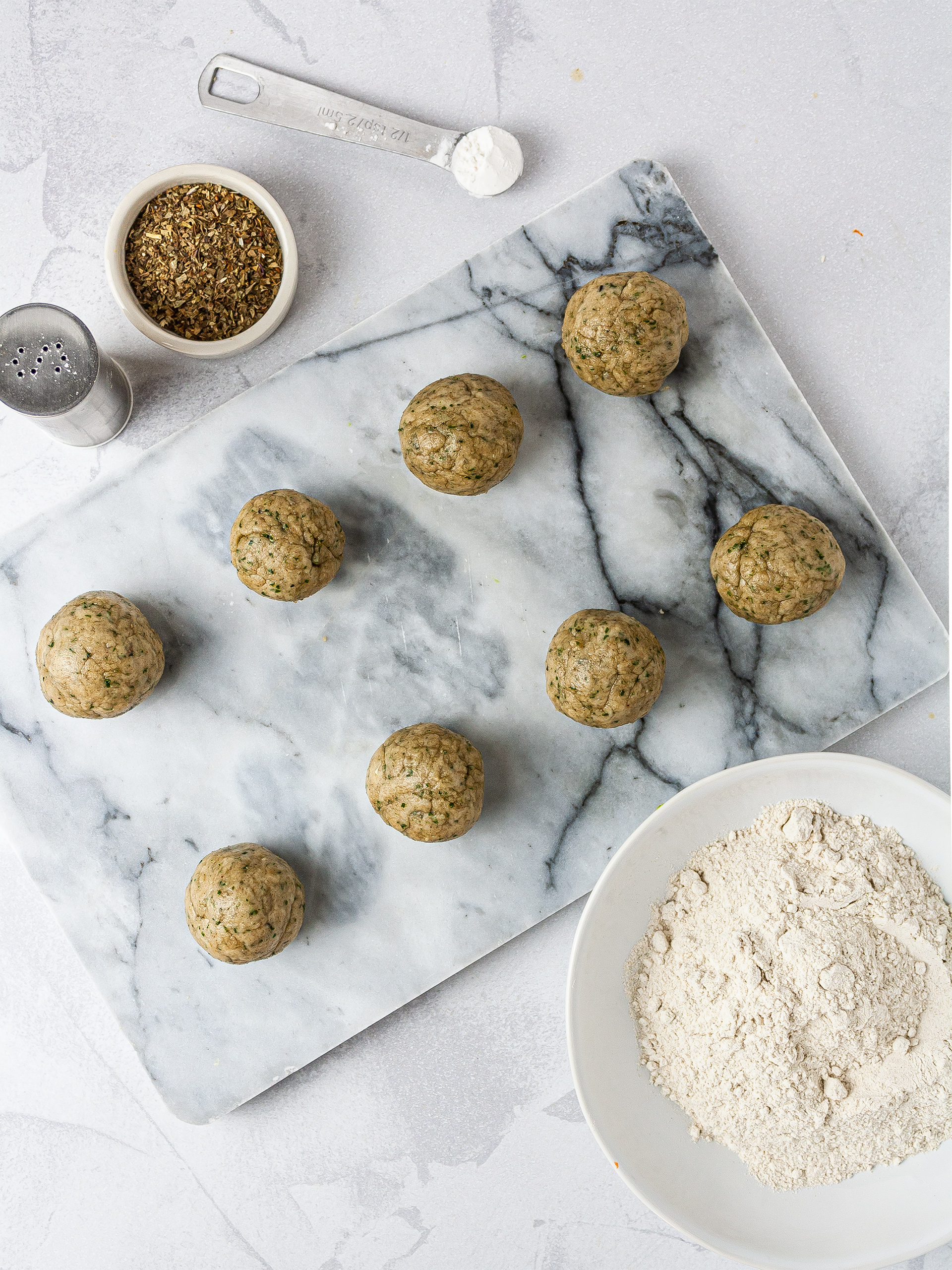 Gluten-free dumplings made with buckwheat flour, salt, oil, and herbs.