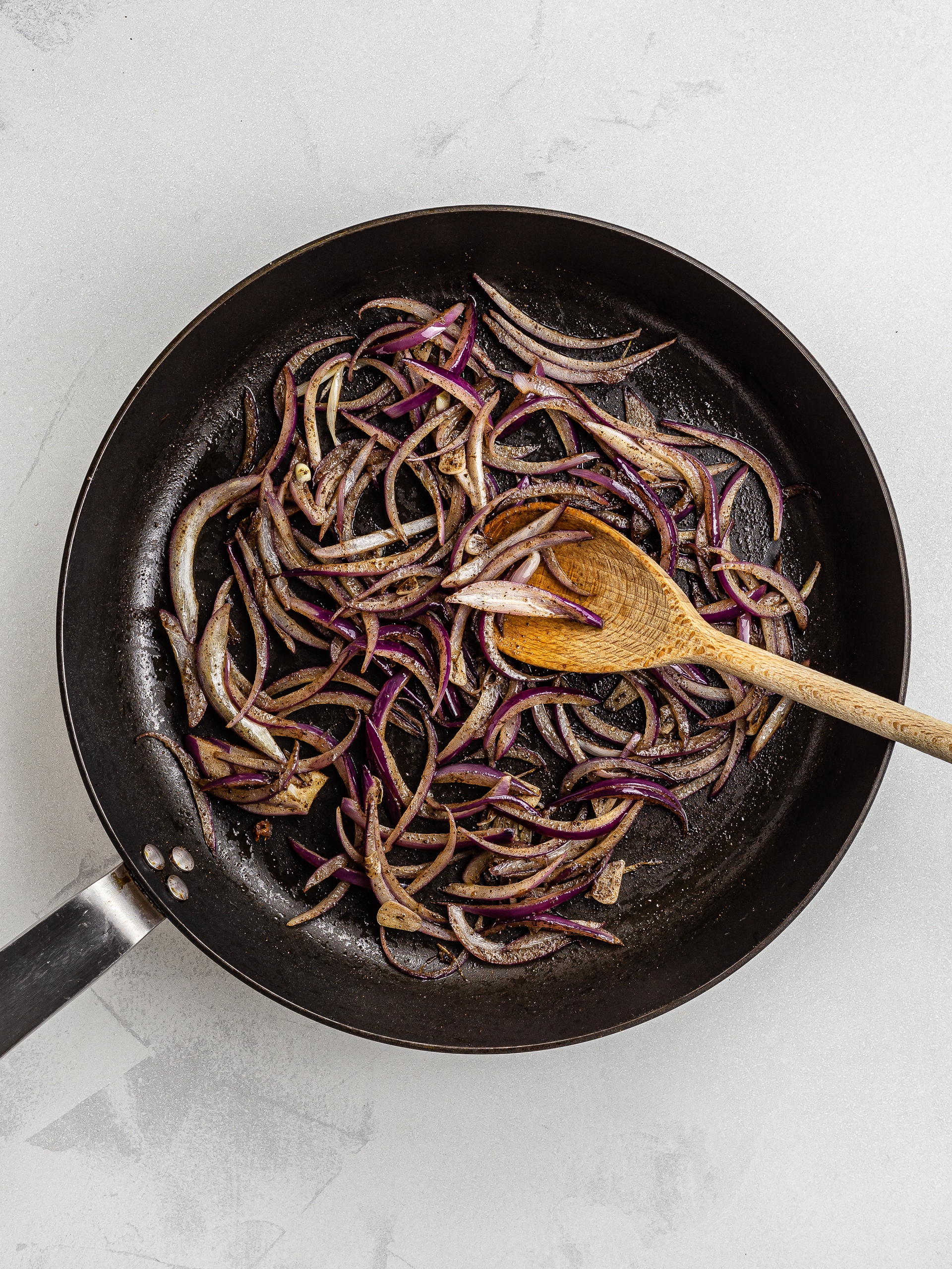 onions sizzled in a skillet with garlic and allspice