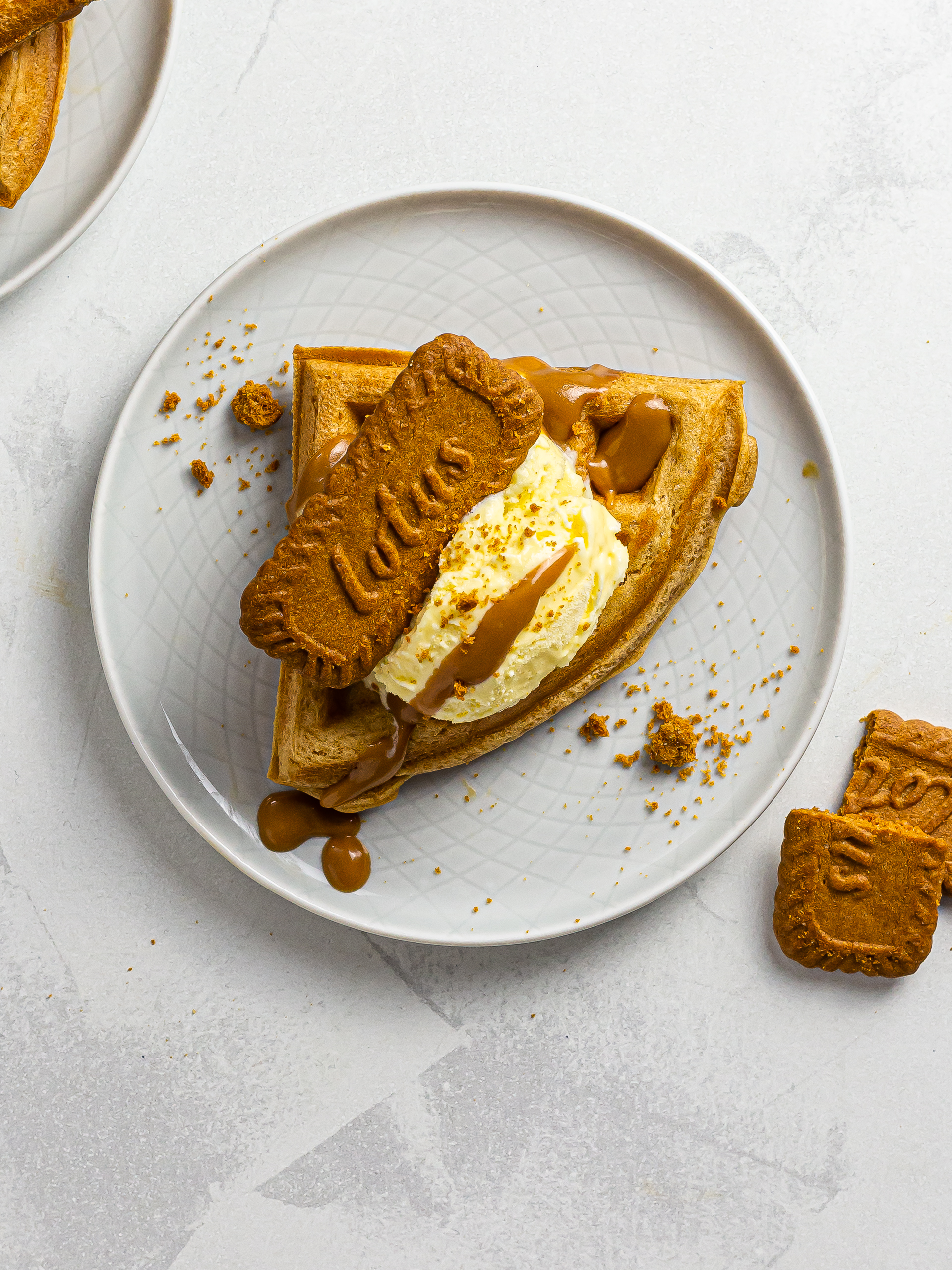 biscoff waffles with biscoff sauce and crumble biscoff cookies