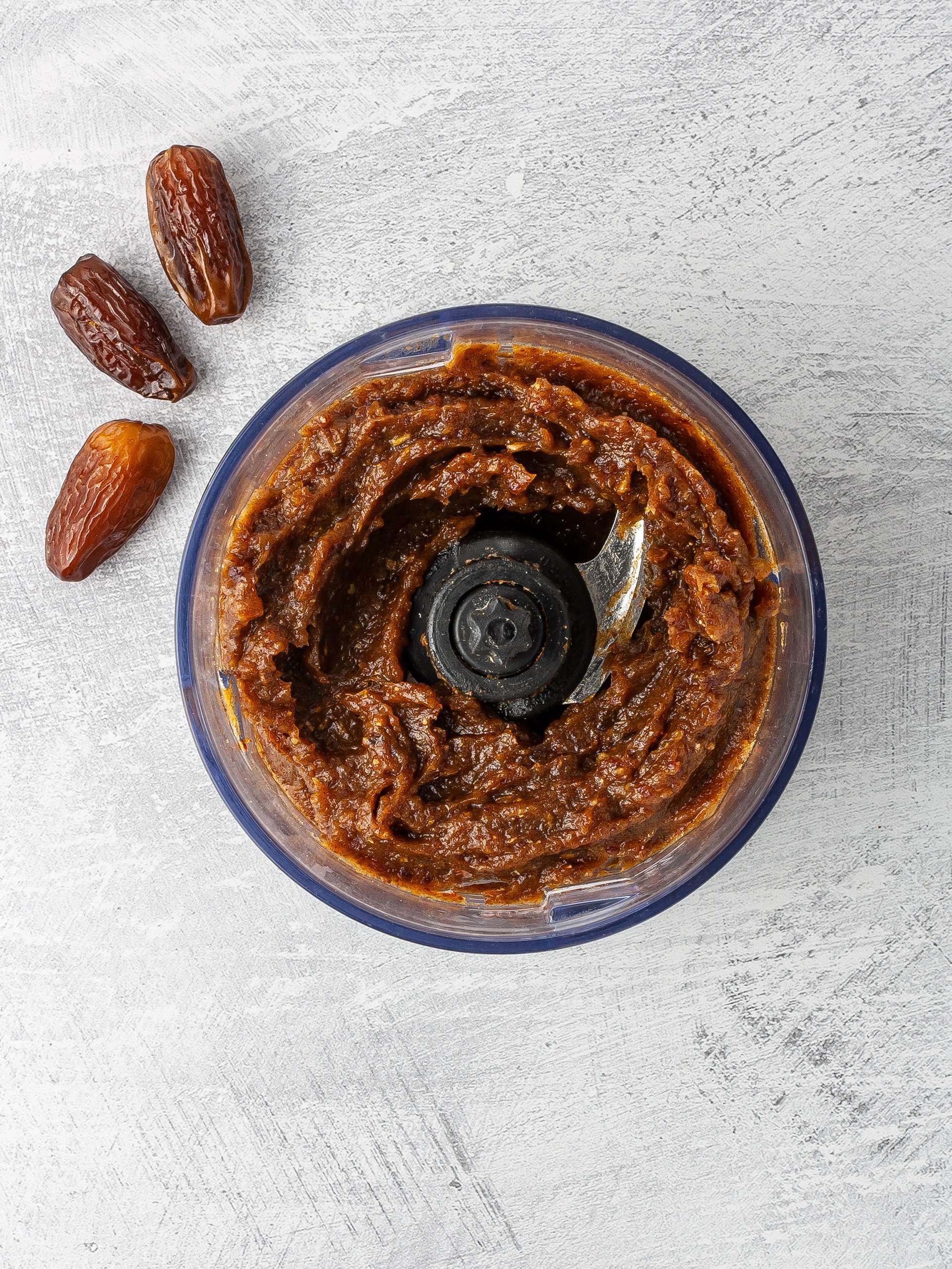 Date paste made with dates and water in a food processor.