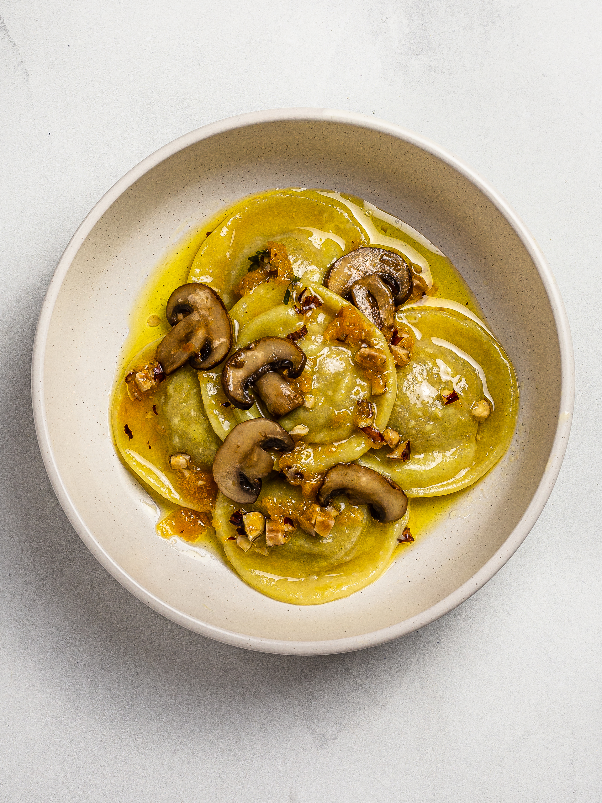 pumpkin mushrooms ravioli in a serving bowl 