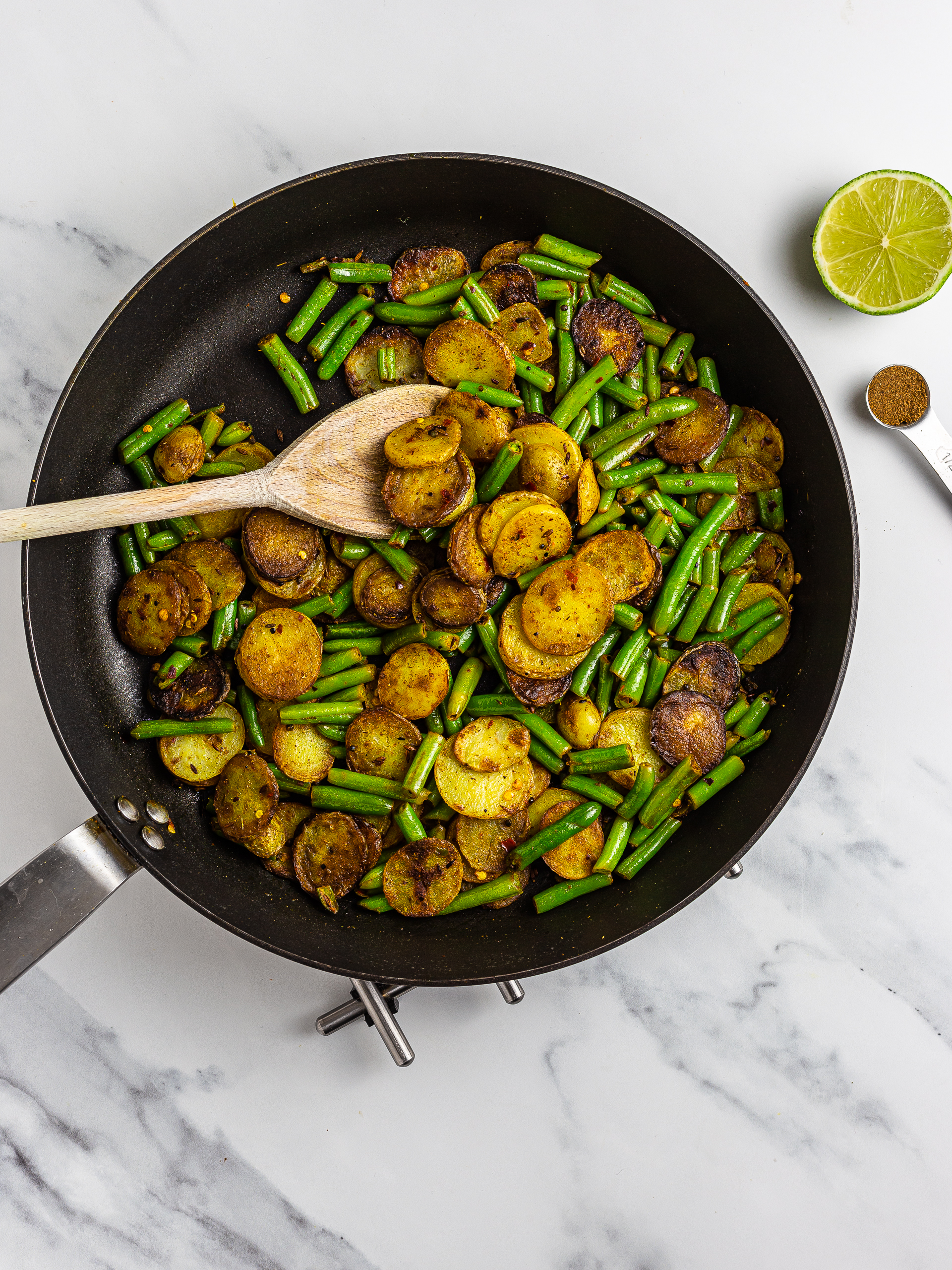 Aloo green beans Indian stir-fry with masala and lime