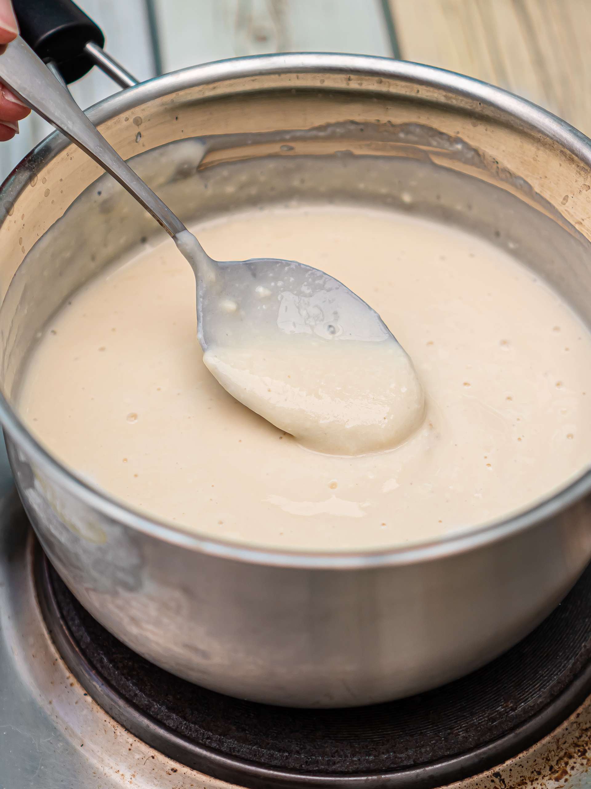 durian cheesecake cream cooking in a pot