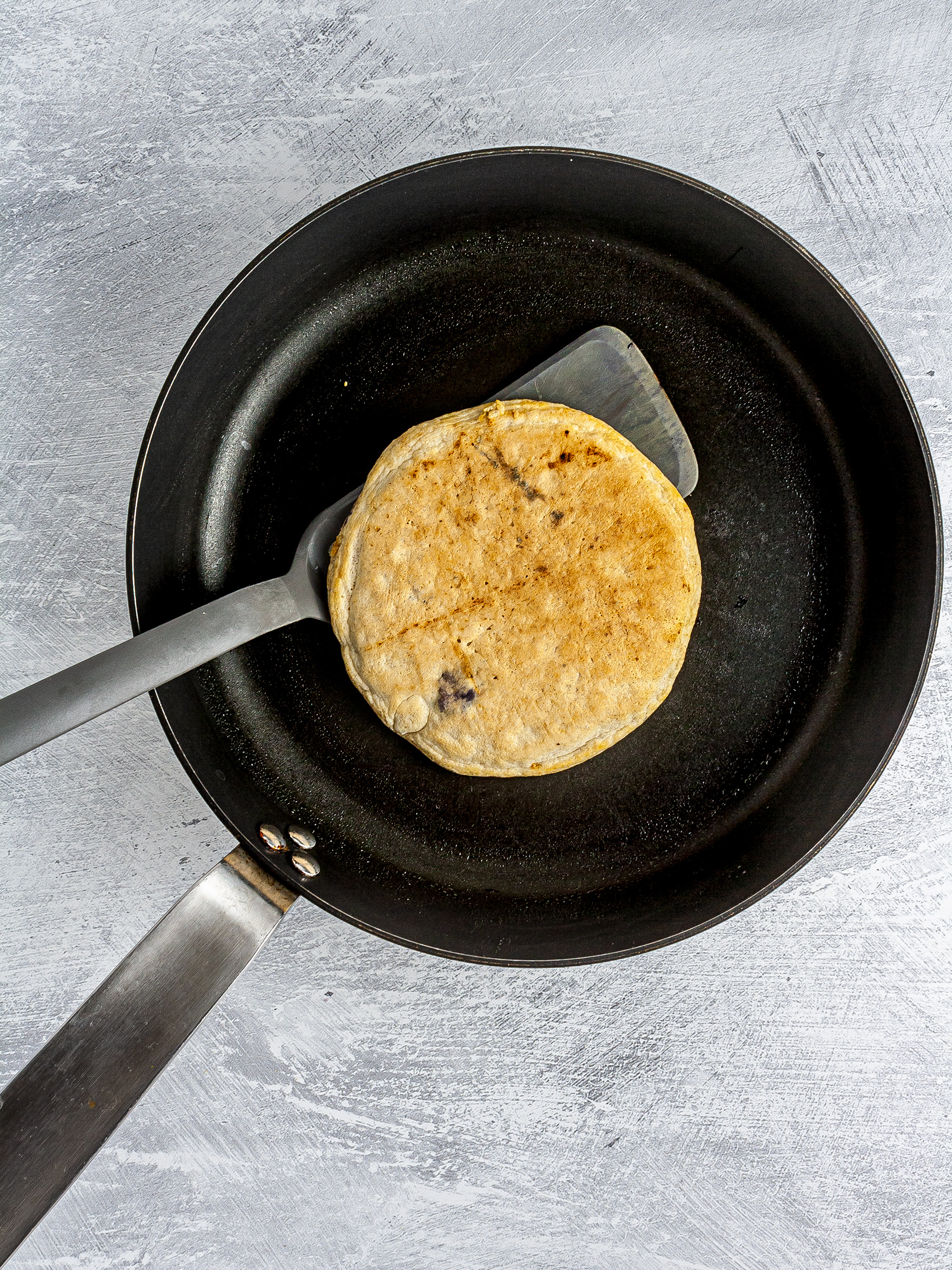 Cooked and flipped pancake