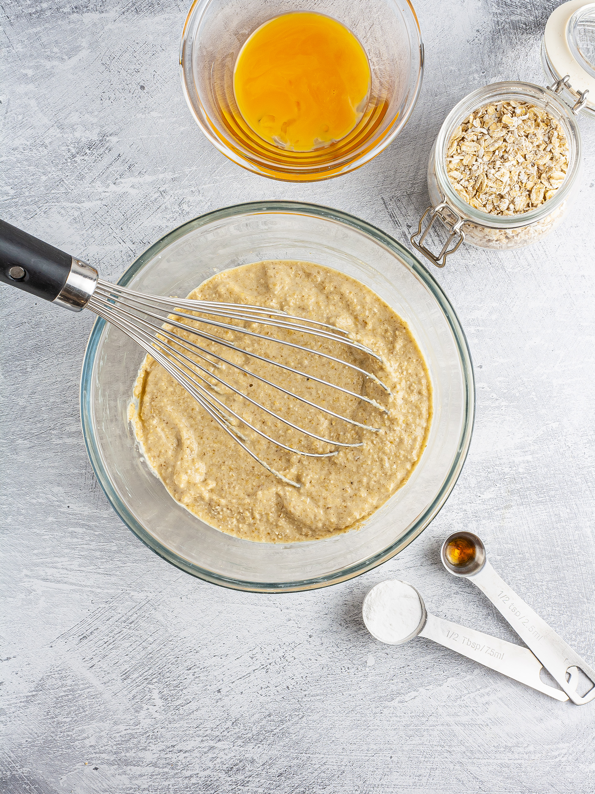 Oat flour, egg yolks, and baking powder mixed