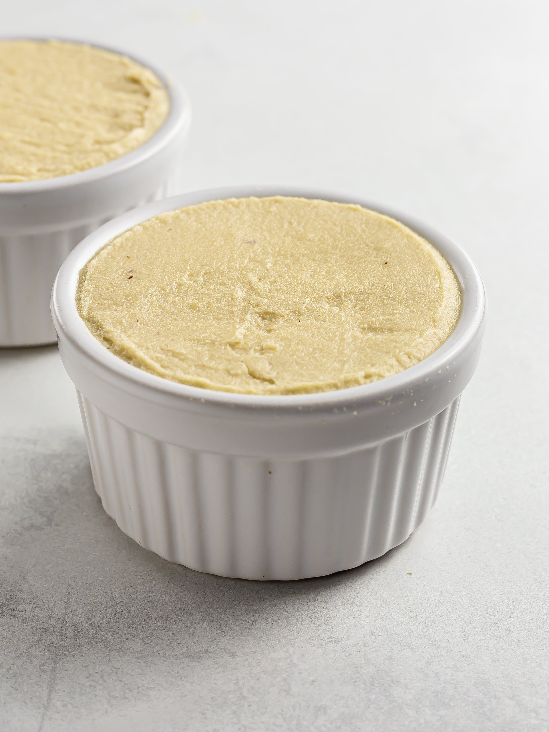 cashew cotija cheese in a ramekin