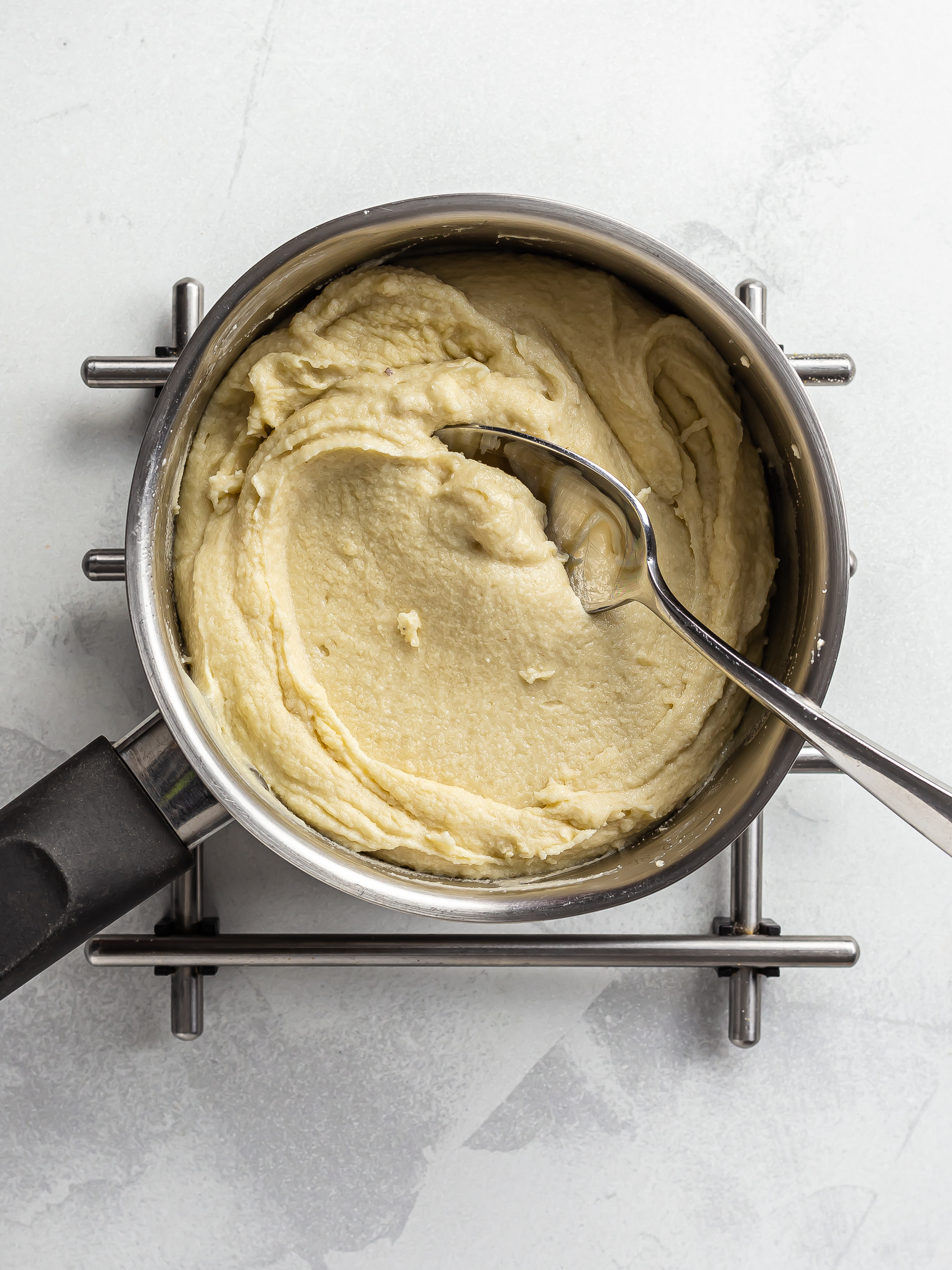 cashews cheese cooking in a pot