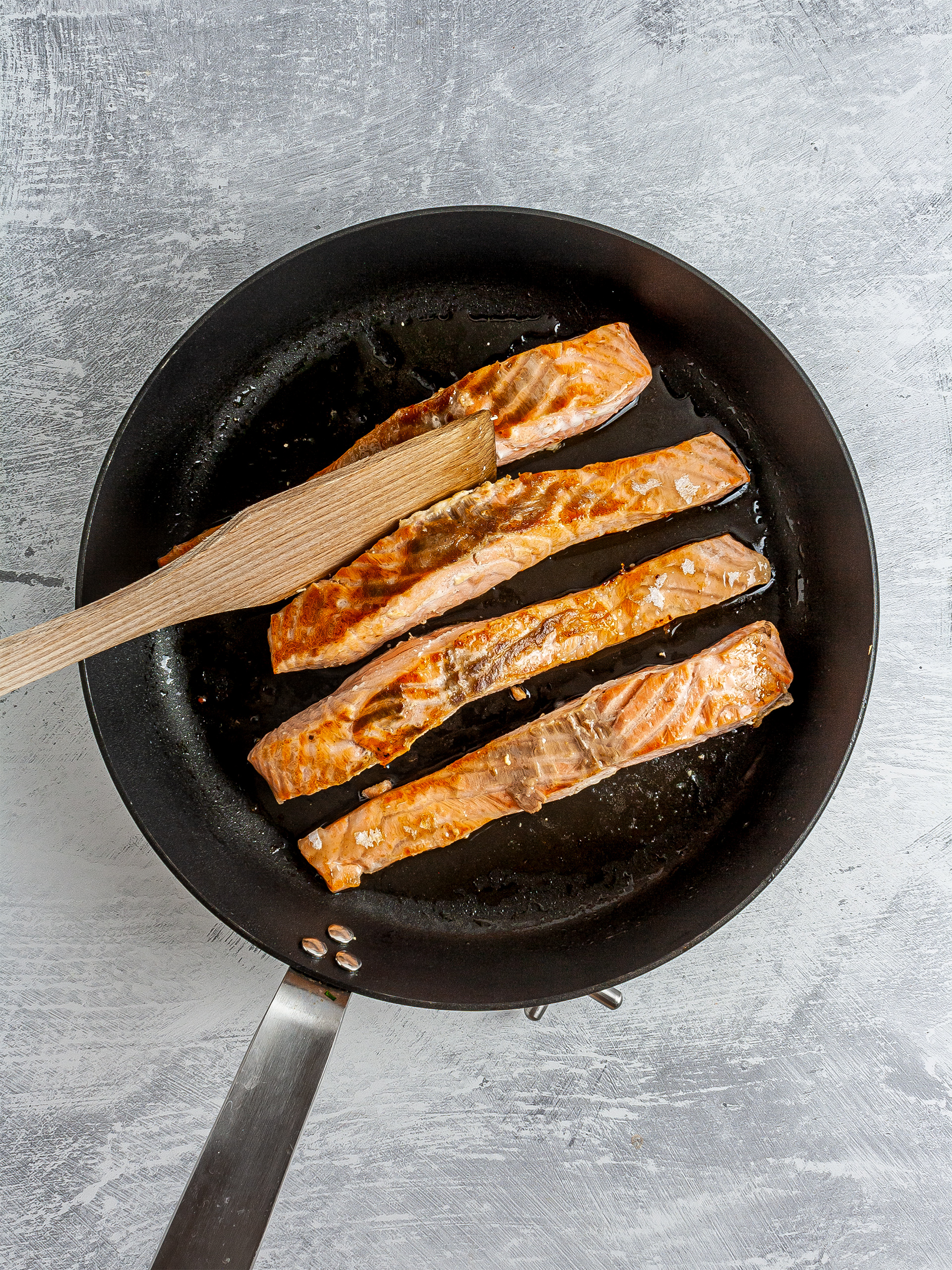 Seared salmon in a skillet