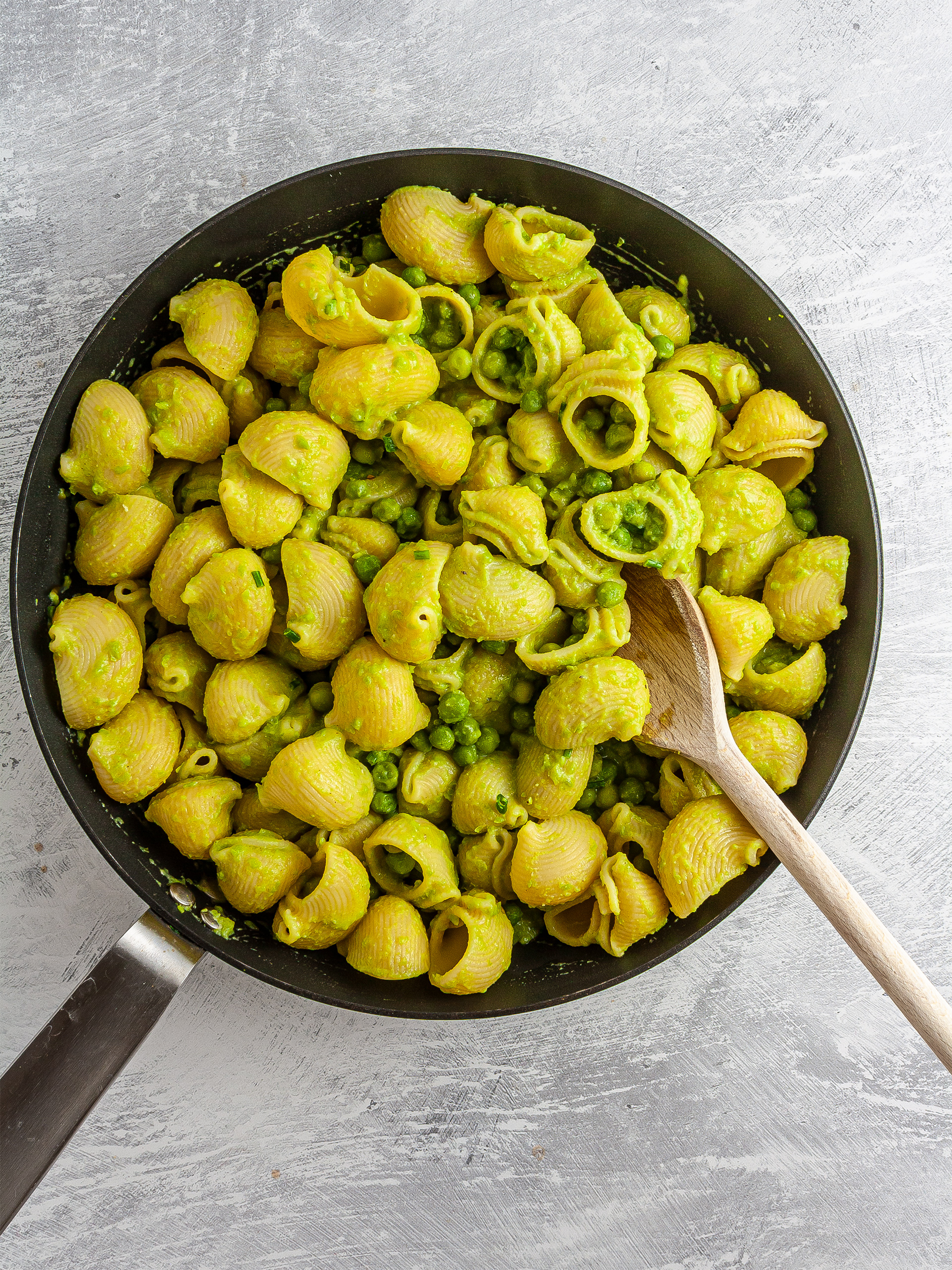 Cooked pasta mixed with peas