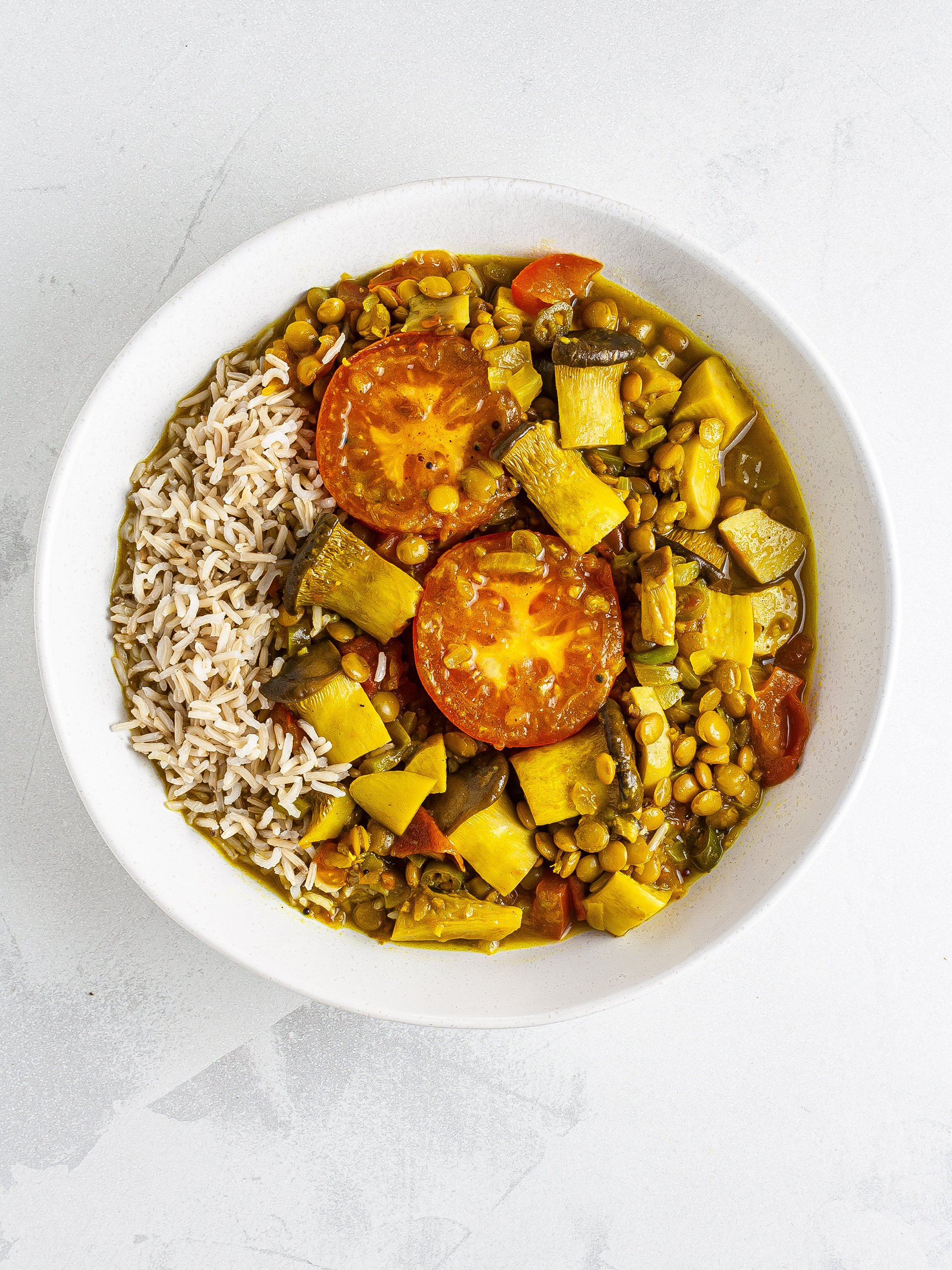 Mushroom curry with rice in a bowl