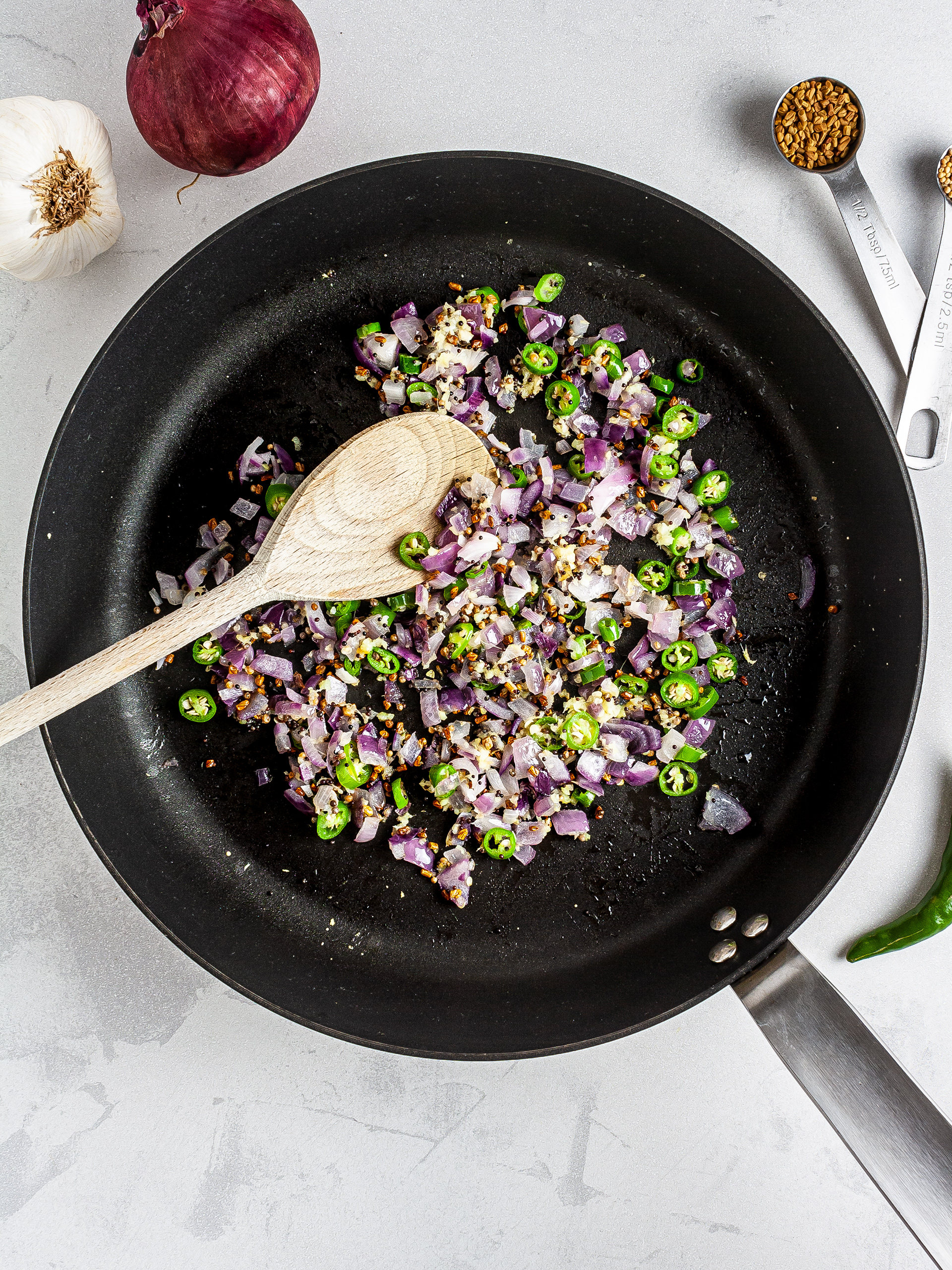 Sizzled spices with onions and chillies