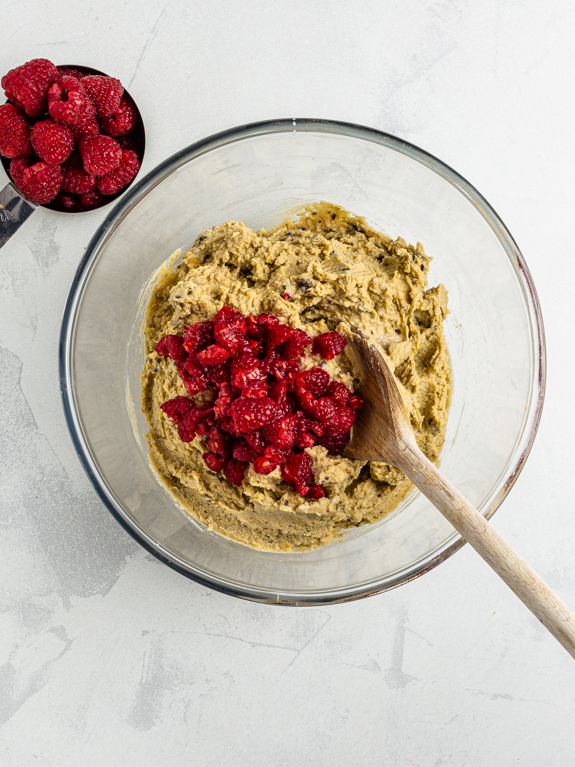 fresh raspberries in chickpea blondie dough