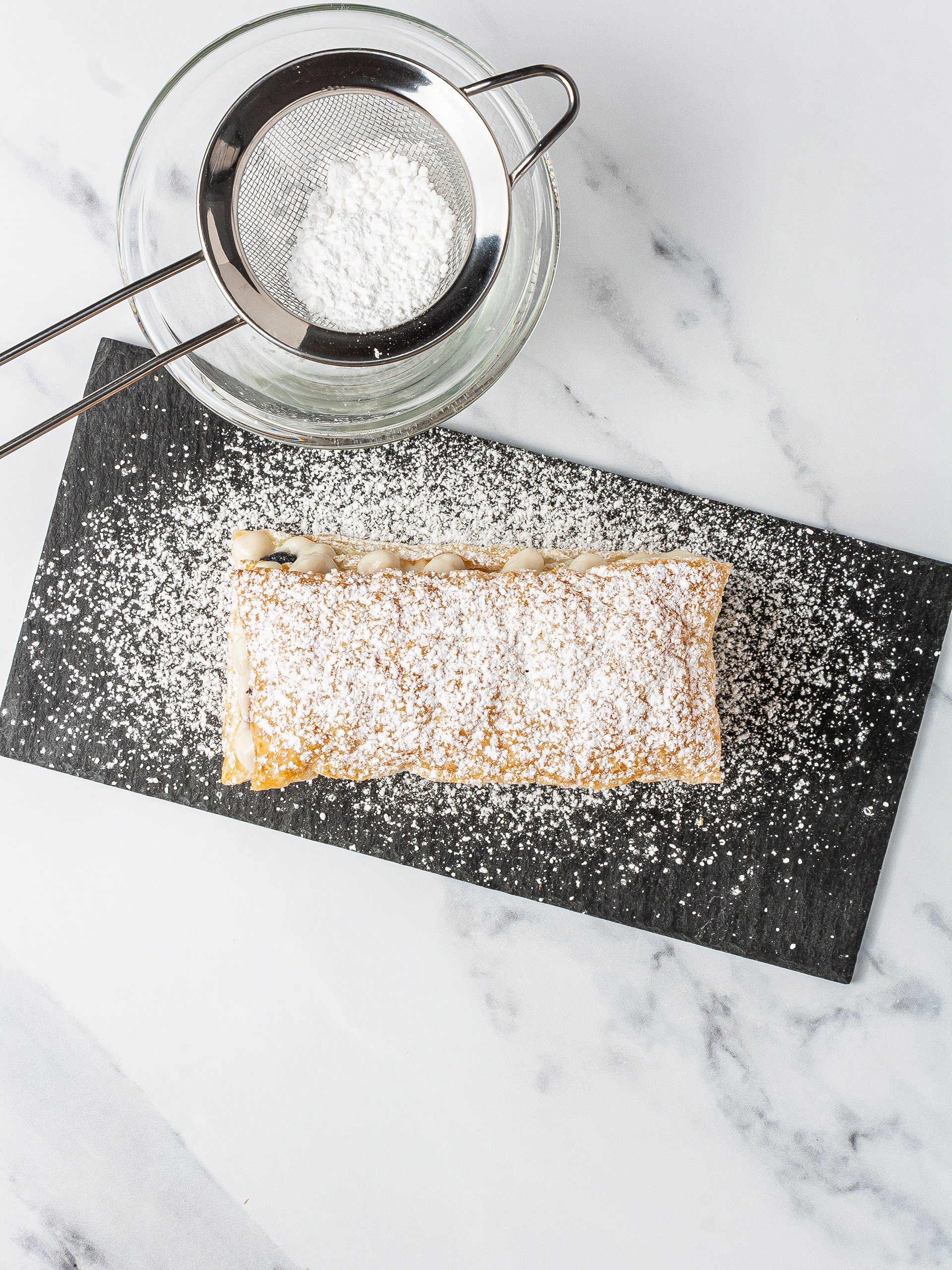 mille feuille pastry with dusted icing sugar