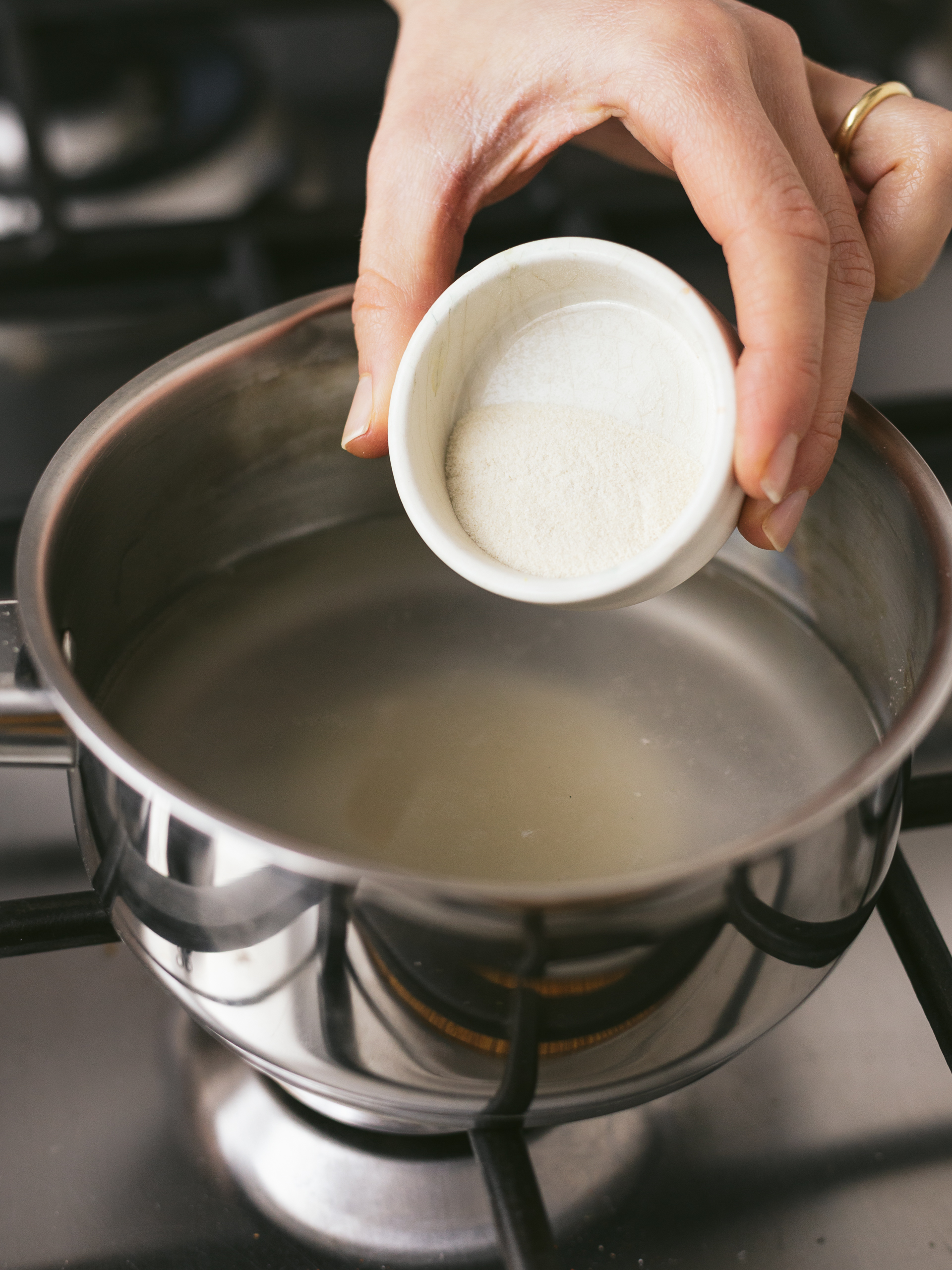 agar agar powder cooking in a pot of water