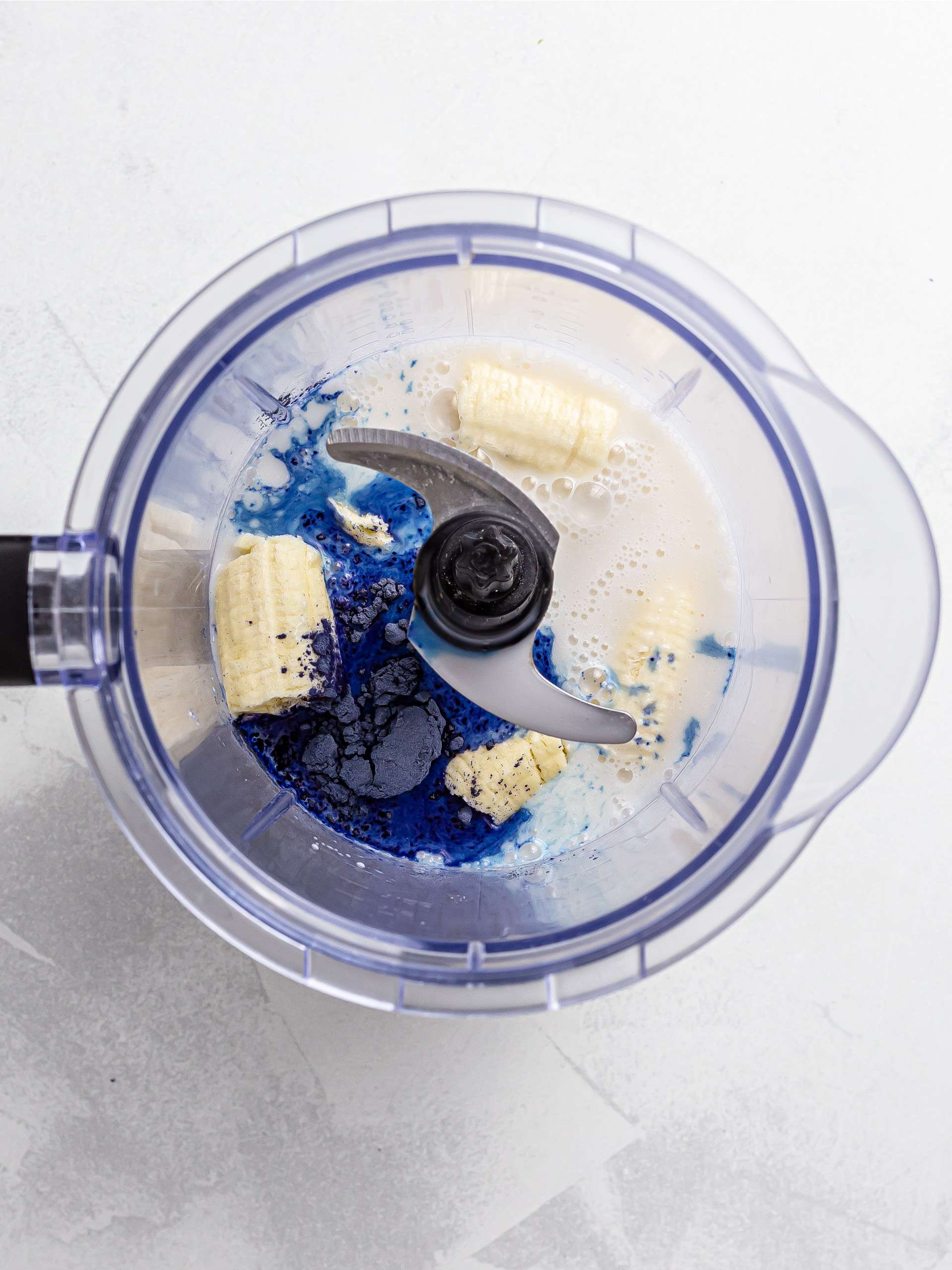 butterfly pea smoothie ingredients in a blender