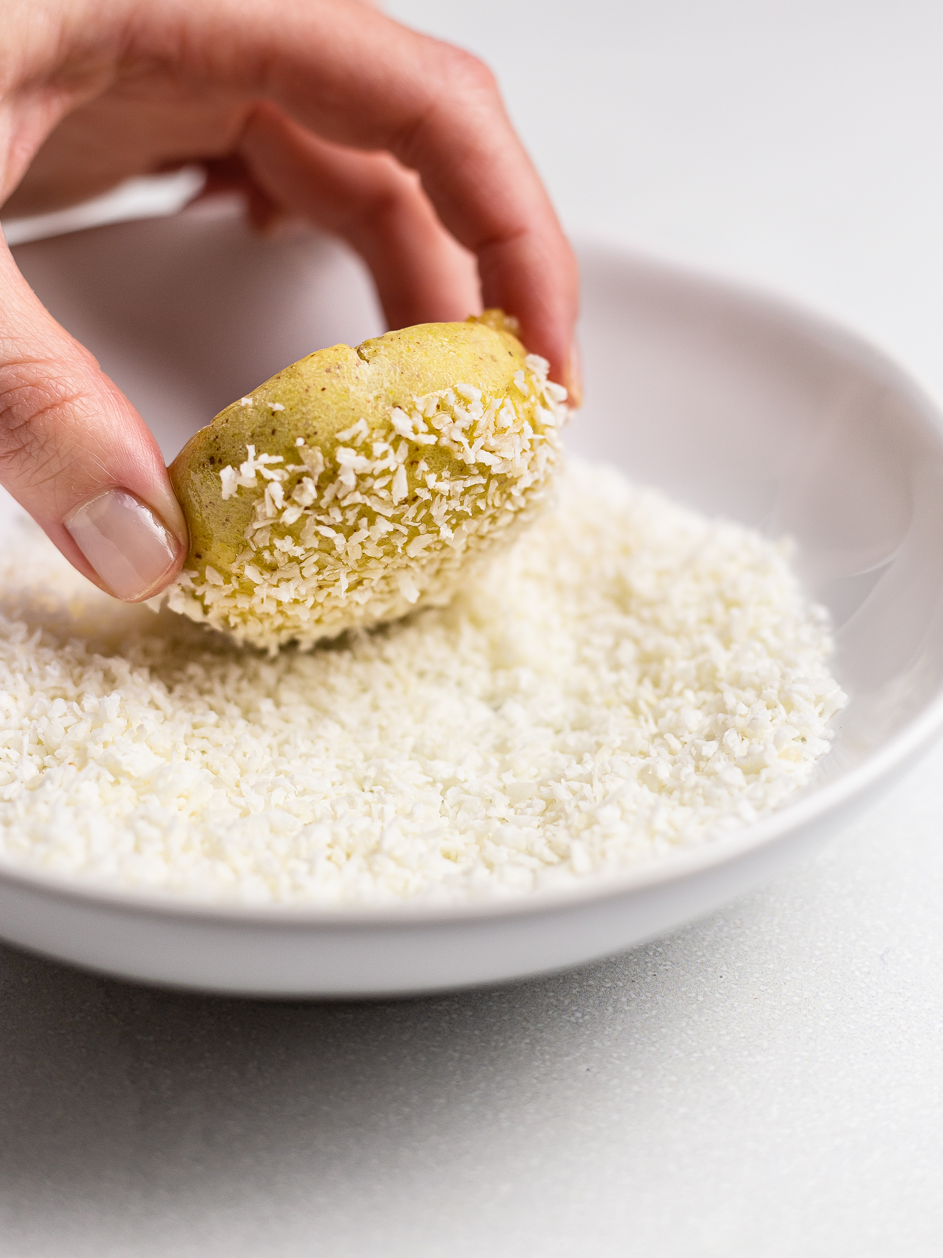 pineapple jam cookie coated with coconut flakes