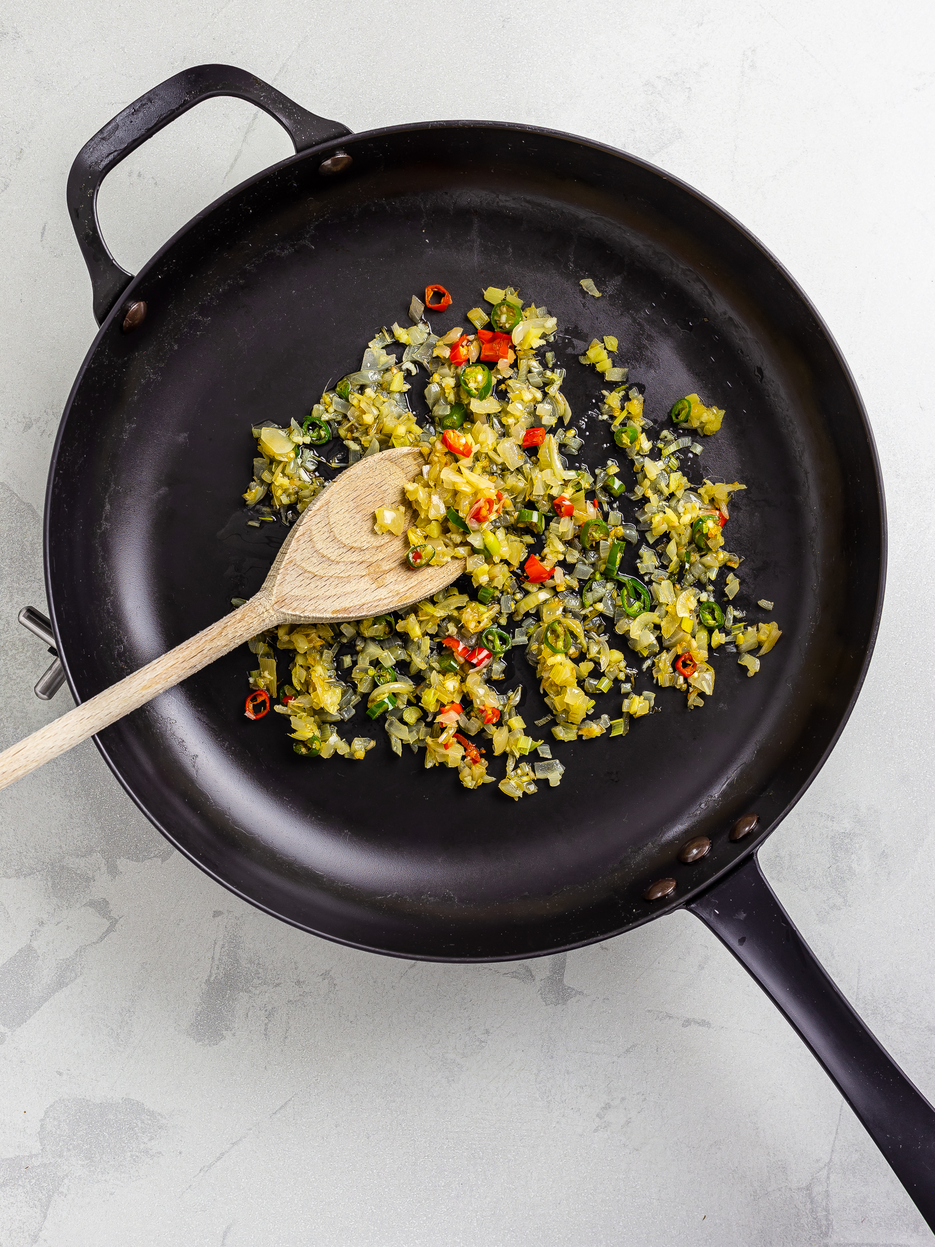 sizzled onions, chillies, ginger, and lemongrass