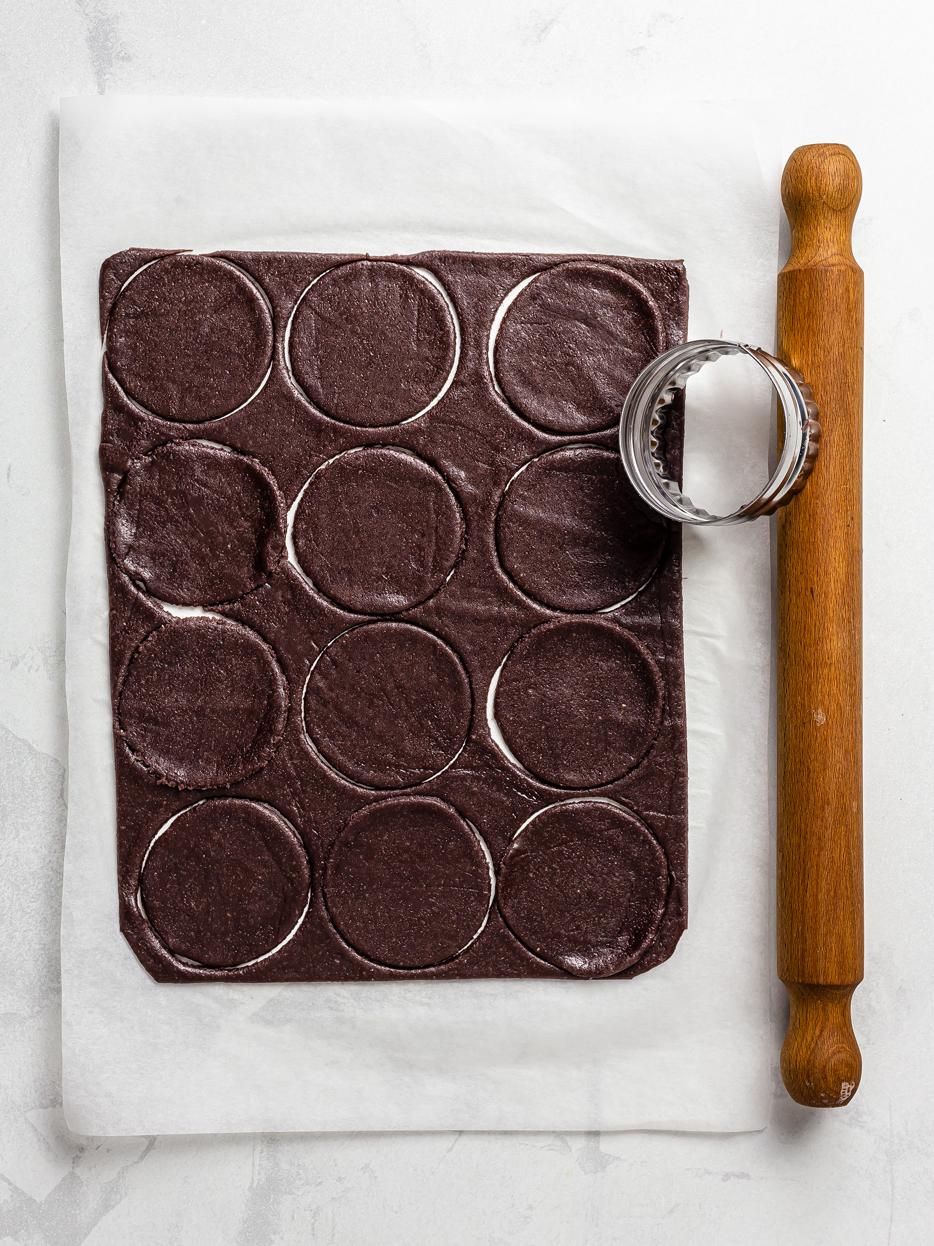 chocolate ube cookie dough rolled and cut into cookies