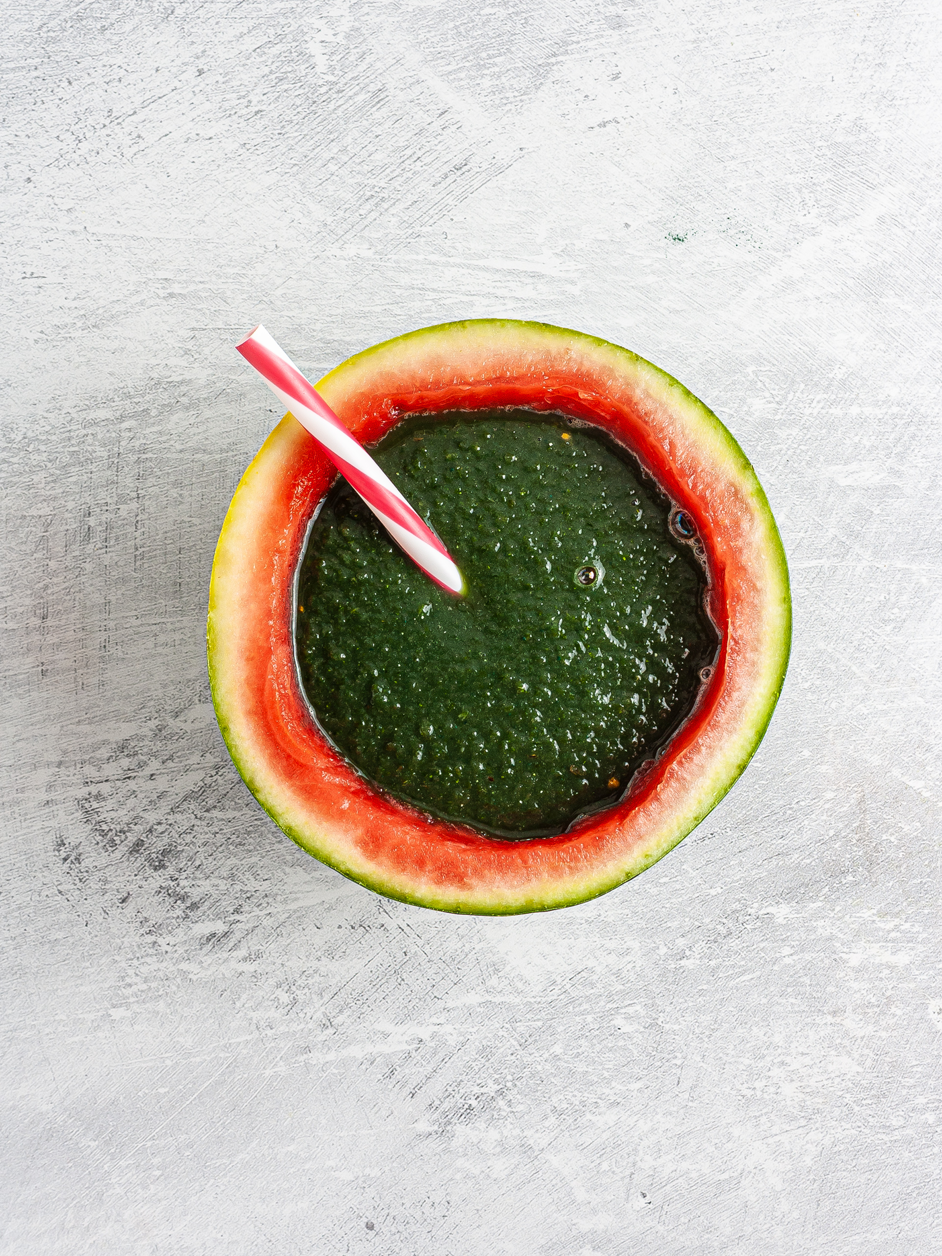 Watermelon kale smoothie in watermelon bowl