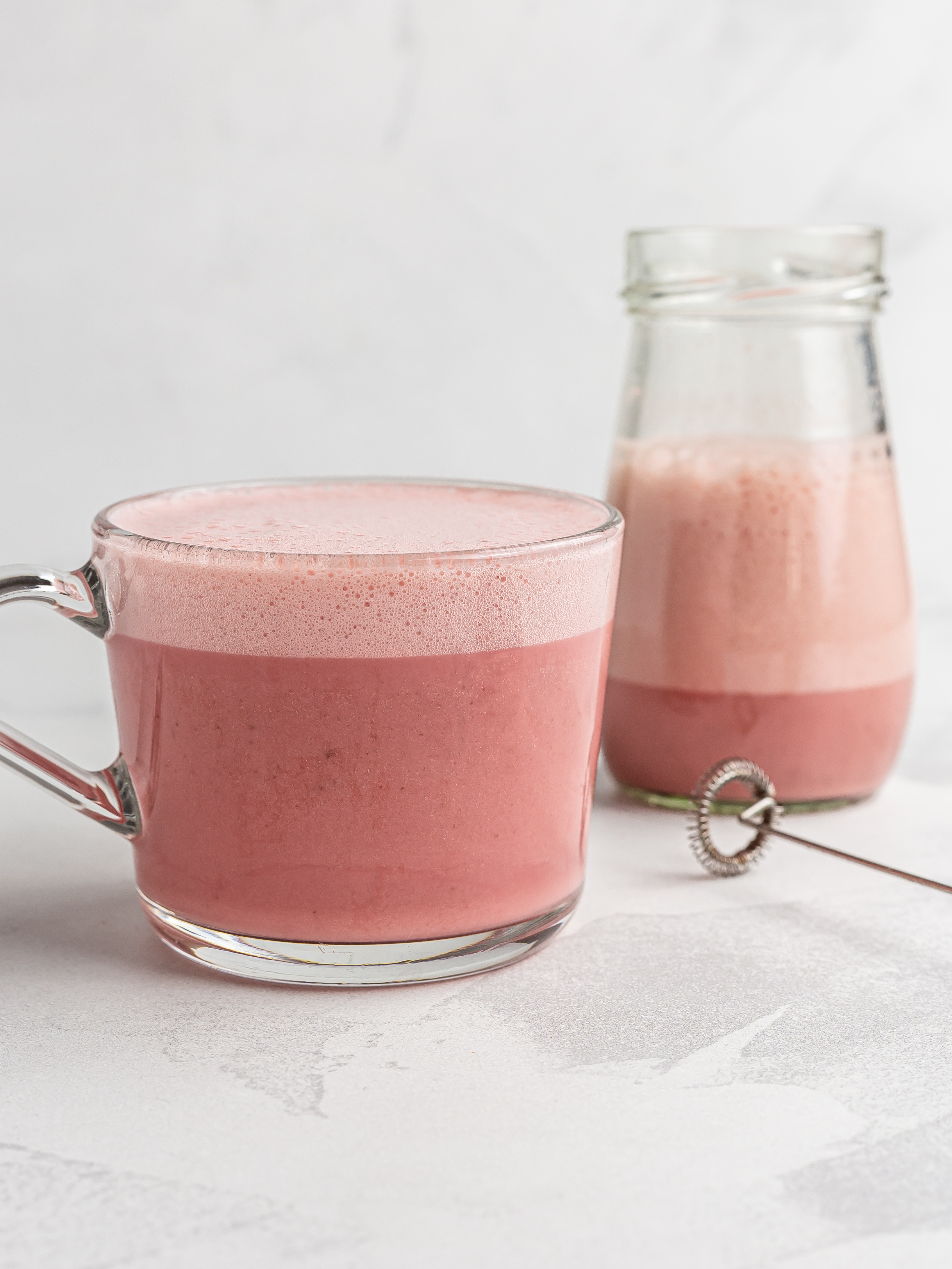 beetroot latte frothed with a hand frother