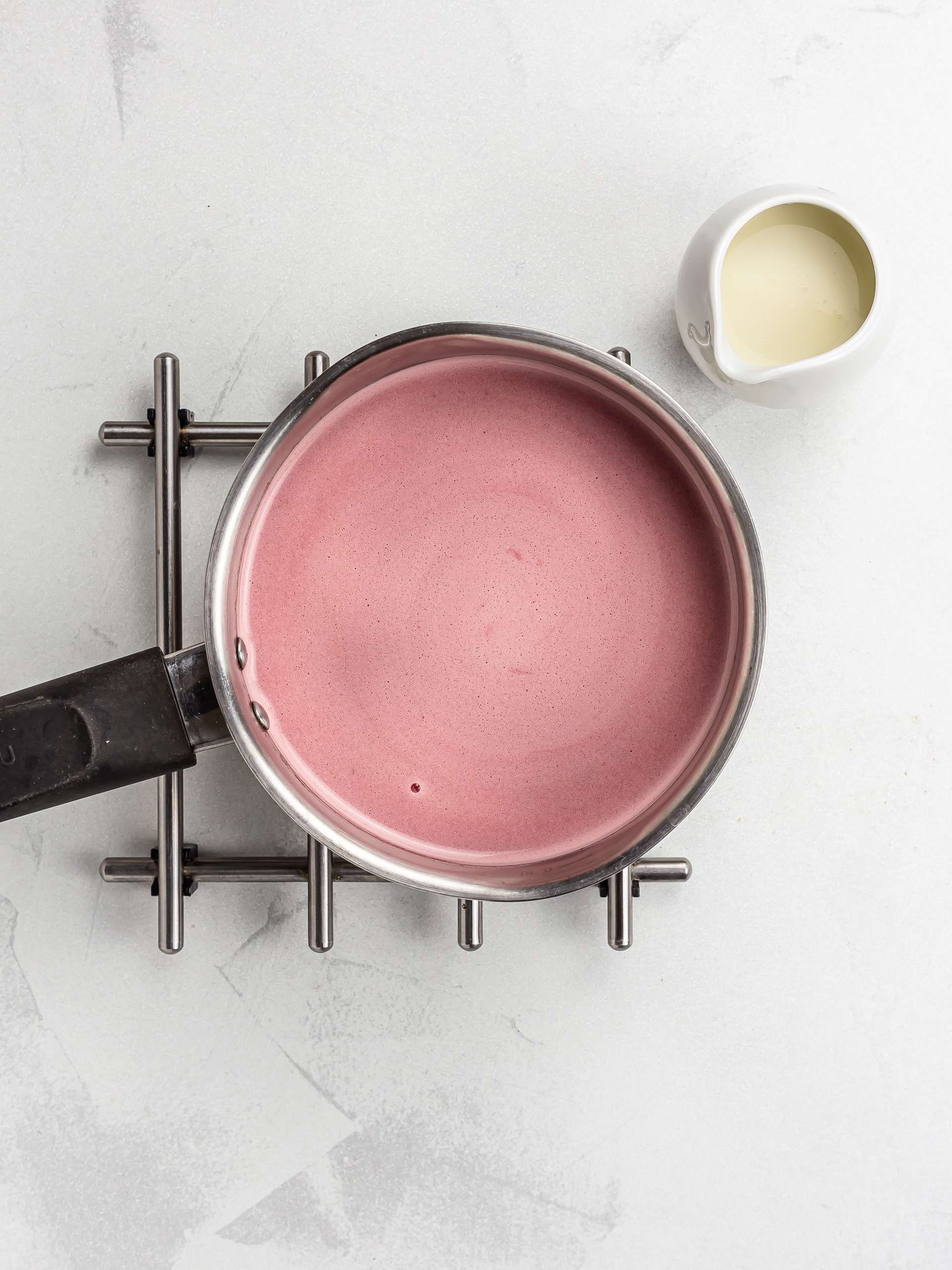 warm beet milk with cardamom and maple syrup