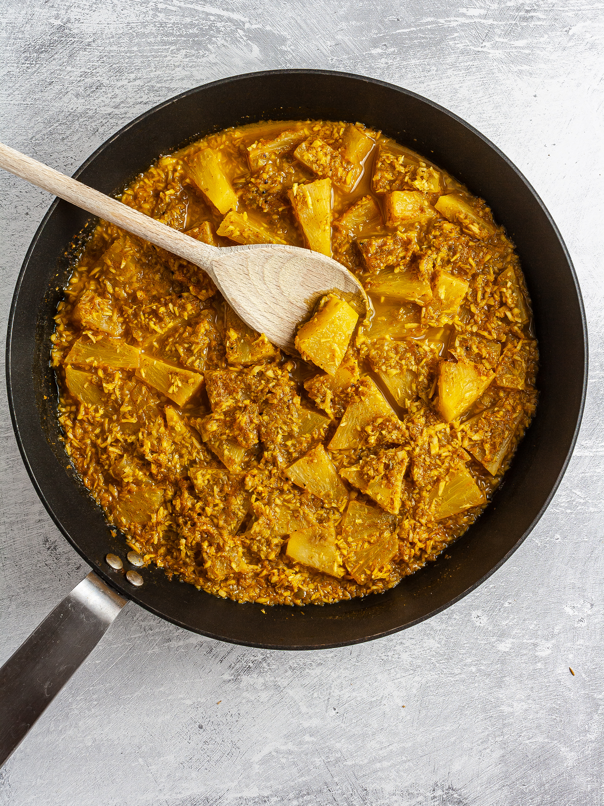 Pineapple curry with coconut and green chillies