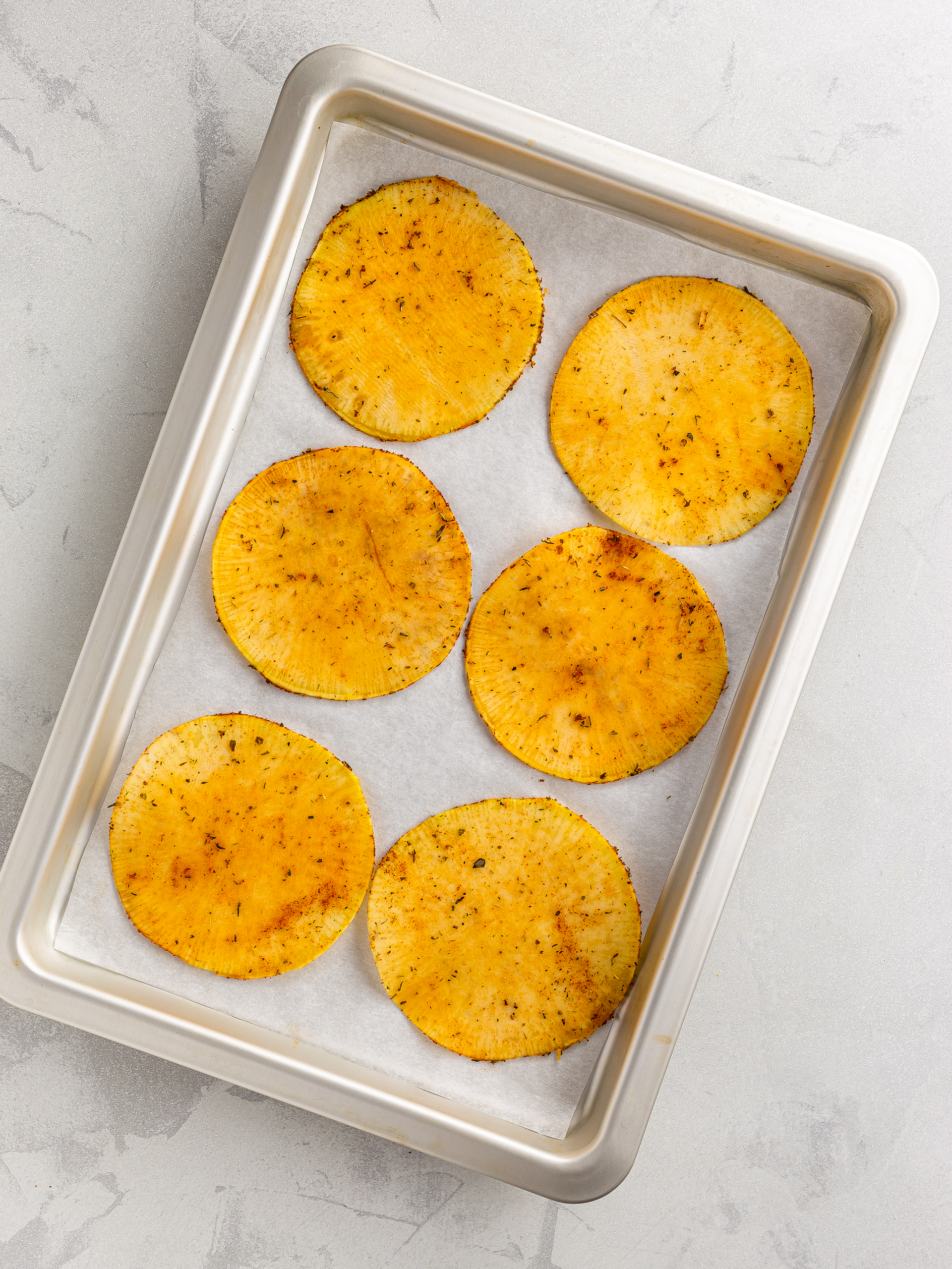 rutabaga chips on a baking tray